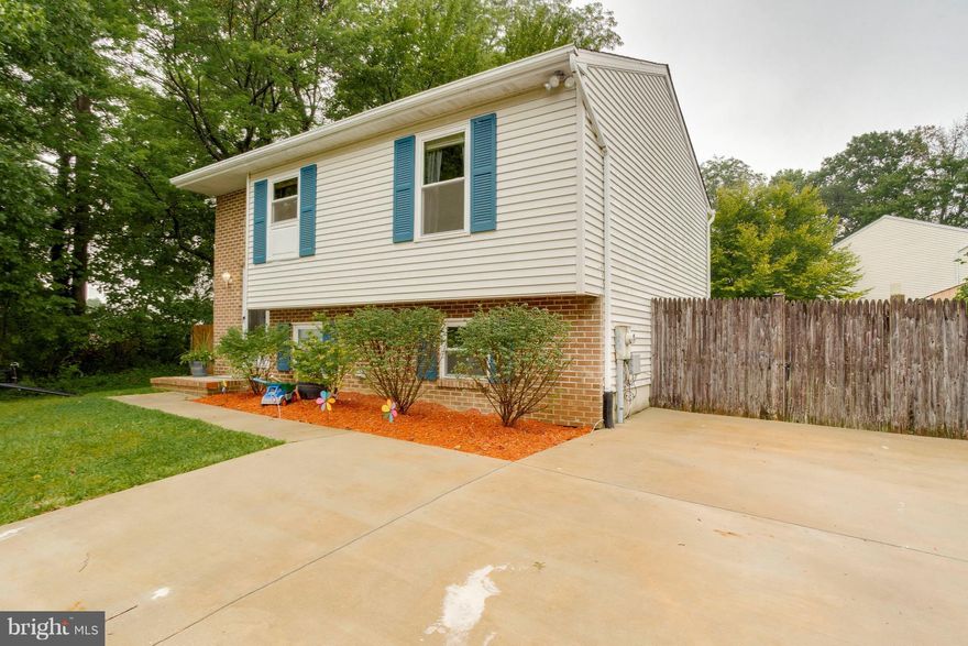 Spectacular single family home at a townhouse price.   Gleaming hardwood floors thru out.   Many updates.  Hot water heater,, sump pump, washer and dryer  and furnace.   Large fenced in yard with shed.  Deck off the living room for easy grilling.   Quiet dead end street.  Seller has found a home of choice