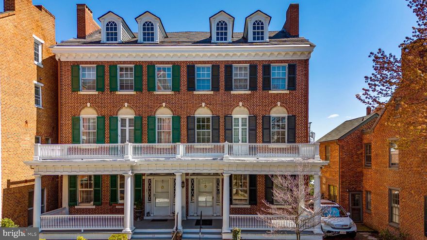 Signature historic duplex on Historic Court House Square with high ceilings,  multiple outdoor decks and many applications from commercial offices to condos to apartments or a grand single family residence.  This is a unique opportunity to own a piece of Frederick history.  Many fire places with unique mantels.  The building has wonderful southern exposure making this a light and bright space on all levels.  With five levels of opportunity from the basement to the attic the building has room for so many uses and applications.   Nice modern two car garage plus surface parking.  Call to set up your exclusive tour of this historic gem.