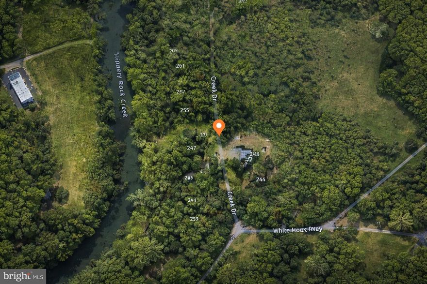 Vacant land parcel located on Creek Drive in Slippery Rock Township, Butler County. Identified as Lot 74 in the Slippery Rock Park Plan of Lots. Property is situated between approximately 241 and 245 Creek Drive. Buyer to verify zoning, utilities, lot size, and permitted uses. Priced to sell.