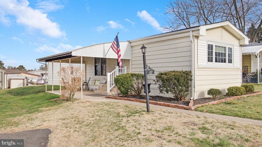 Easy living in the vibrant 55+ active community of the Village of Neshaminy Falls, where you're not just buying a home but investing in a lifestyle! Immerse yourself in the warmth of community spirit as you join neighbors in the clubhouse for social gatherings and events that make this community special. Relax at the sparkling pool, where every day feels like a vacation.  This 2 bedroom 1.1 bath home is nestled on a peaceful lot with a covered front patio and two dedicated parking spaces.  Natural light welcomes you by illuminating spacious rooms with gleaming hardwood floors throughout the living areas. Priced for some updating and personal touches, this residence offers a living room with an adjacent dining area. The kitchen has plenty of cabinets and counter space, and a full-size refrigerator is included. Double doors in the kitchen reveal the washer and dryer.  The bedrooms are strategically positioned on opposite sides of the home, and privacy is ensured for both residents and guests alike. The bathroom features a brand new walk-in shower surround, replaced in 2023.  Electric heat and central air maintain optimal comfort year-round, with sewer and trash services included in the monthly fee. Snow removal from all main roads, parking lots, driveways, and individual parking spaces is also part of the package when snowfall exceeds 6 inches. Close proximity to #309, the PA Turnpike, and the Blue Route, surrounded by an array of excellent dining options and nearby shopping, offers a thriving and diverse lifestyle for those seeking convenience and leisure. Don't miss this extraordinary opportunity to make this your slice of paradise!