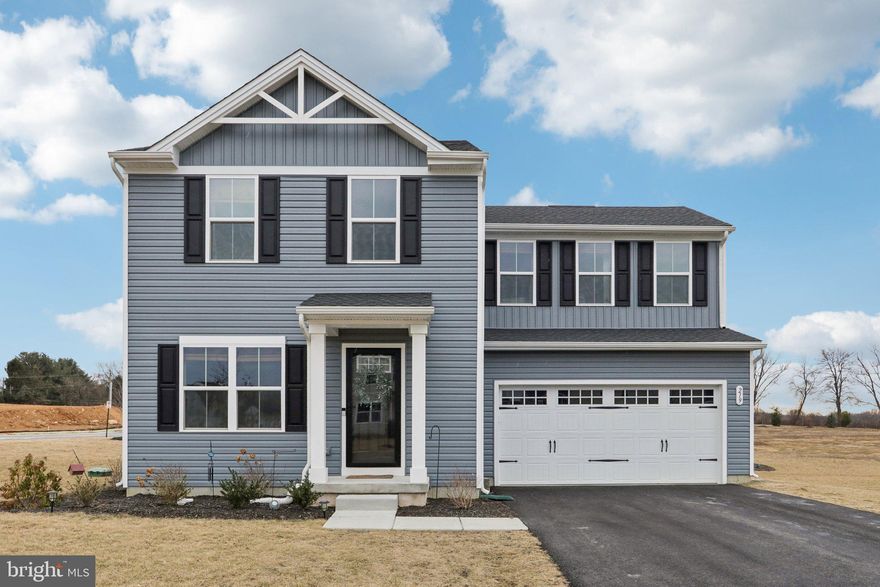 Discover the charm of this stunning Aspen model home in the highly desirable Chestnut Ridge Community! Built just two years ago, this beautifully finished home offers a neutral color palette and is truly move-in ready. Thoughtfully upgraded, this home features luxury vinyl plank (LVP) flooring throughout the first floor, upgraded carpeting upstairs, and a fresh, stylish paint color throughout. A custom accent wall in the living room adds a unique touch, creating a warm and inviting space.  With 1,500 square feet of living space, three spacious bedrooms, and two full bathrooms, this home is designed for both comfort and entertaining. Step inside to an inviting open-concept floor plan, where the living room seamlessly connects to the dining area and kitchen. The heart of the home is the stylish kitchen, featuring a large center island, elegant white cabinetry, quartz countertops, stainless steel appliances, and a pantry for extra storage. Just off the kitchen, you'll find convenient access to the attached two-car garage.  Upstairs, the primary suite is a relaxing retreat with a spacious walk-in closet and a private en-suite bath. Two additional bedrooms, a full hall bath, and a second-floor laundry room complete this level. The expansive unfinished basement offers endless potential—whether you envision a family room, home office, or workout space. Off the rear of the home is a large deck, perfect for hosting gatherings or enjoying a quiet evening outdoors.  Ideally located in Chester County, this home offers the perfect balance of privacy and convenience, with easy access to major roads, shopping, dining, and more. Don’t miss your chance to own this beautifully upgraded home—schedule a tour today!