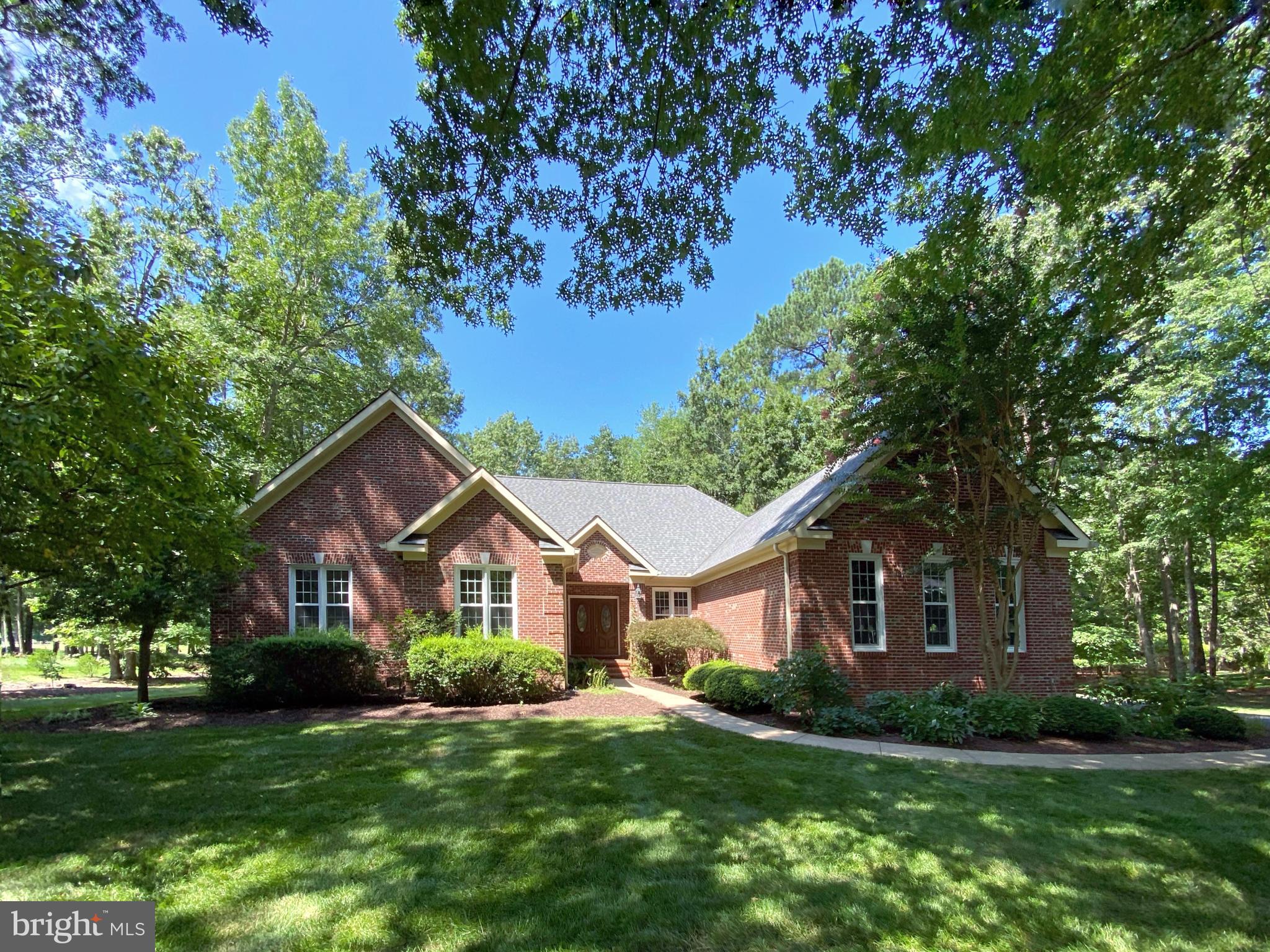 ​Gorgeous custom Dream Home sited on a beautiful lot overlooking the majestic Fairway of the Fawn Lake golf course inside the luxury community of Fawn Lake. Designed for casual main level living, this charming brick ​Rancher offers a semi-open floor plan filled with​ beautiful details at every turn.
​Double doors welcome you to a grand Living Room sitting at the center of the home. Featuring soaring trey ceilings, Palladium windows and plenty of inviting space to gather and entertain. ​
The Chefs Kitchen with solid Oak cabinets, new stainless steel appliances ​and granite counters, features a charming sunlight Breakfast ​nook with French doors that provide access to the inviting screened Porch.
The Family Room features a ​gas fireplace ​flanked by custom built-in bookcases and media cabinetry. French Doors lead​ to an expansive deck and a charming screened Gazebo, offering extended living and entertaining opportunities while overlooking the peaceful backyard, and golf course just beyond.
The gracious Main Level Owner's Suite with a sunlight Sitting Room, offers a large walk-in closet and a luxurious Spa Bath with soaking tub, tile shower and​ a huge vanity with dual sinks.
Two additional spacious bedrooms with walk-in closets are anchored by a Full Bath. A beautiful private Den serves as a perfect home office or guest room.
A Convenient Laundry Room with ​utility sink and ​cabinetry, ​along with a Powder Room completes the Main Level.
The large unfinished basement provides plenty of storage and space for future expansion.
An oversized 3-Car Garage and extended driveway provide ample parking and auto storage.
Meticulously maintained, the home features a New Roof ​installed in 2018, along with new gutters. The new energy efficient HVAC was installed in 2021. The water heater was installed in 2023. The ​beautifully landscaped grounds are easily maintained with the in​-ground irrigation system​ installed on the property.​ Custom built, this charming home is perfectly nestled on a quiet street on a beautiful .91 acres surrounded by mature hardwood and blooming trees providing wonderful views of nature and privacy!
Located ​in a super desirable established area right in the heart of ​Fawn Lake, within walking distance to the Country Club Restaurants, tennis, golf, beach, fitness center, marina and all the wonderful amenities Fawn Lake has to offer!
Come experience what the Fawn Lake lifestyle is all about where every day is a vacation!
**The beautiful Luxury Fawn Lake Community offers amazing amenities such as a boating recreational lake, beach, Arnold Palmer designed golf course, tennis courts, baseball and soccer fields, dog park, volleyball courts, walking trails, Community Clubhouse, marina, fitness center, restaurants, Country Club, playgrounds, and so much more! Located in the countryside near the town of Fredericksburg, VA, surrounded by park lands and only a few miles to the farm market, wineries, and award winning breweries! Conveniently located to shopping, restaurants, top-rated Riverbend District schools, and I-95.