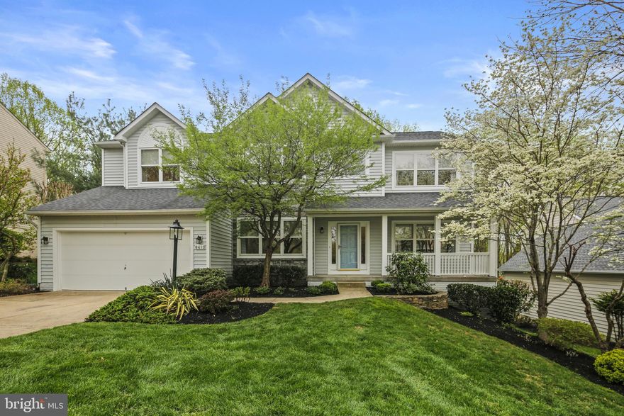 Welcome to Your Dream Home in River Hill!  Perfectly placed on one of the most sought-after streets in River Hill, this stunning gem is full of surprises. Step through the inviting front porch into a bright two-story foyer, then flow into spacious living and dining areas—or retreat to your private home office.  The gourmet kitchen impresses with a large island, sleek new cabinets and upgrades plus gorgeous views of Middle Patuxent parkland. The family room wows with cathedral ceilings and natural light galore. Step onto the updated deck and soak in the serenity.  Upstairs, the luxurious primary suite includes two walk-in closets, an upgraded en-suite, and a flexible sitting room (hello, 5th bedroom potential!). Three more generous bedrooms, a full bath, and a laundry room complete the level.  The walk-out lower level is built for fun—second family room with a pool table, a 5th bedroom, full bath, and access to a brick patio. Tons of storage, too!  Major upgrades? Check: HVAC (2014), roof (2016), gutter protection ( 2021), water heater (2019).  This home has it all—space, style, and a killer location. Come make it yours!