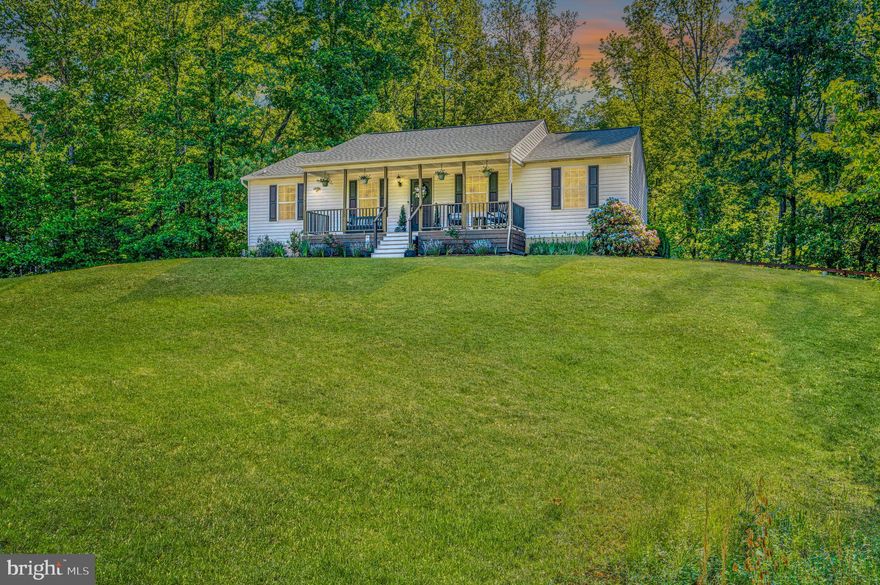 Set on 3.5 wooded acres in the northern part of Saint Mary’s County, this home offers a private, elevated setting with a calm, tucked-away feel. It sits up on a hill and takes full advantage of the surrounding nature.

Inside, the layout is open and well thought out. The main level flows easily between the living, dining, and kitchen spaces, with the primary suite and laundry all conveniently on one floor. The walkout basement adds even more finished space with a large rec room, fourth bedroom, full bath, and a versatile area that works well for a workshop, gym, or additional living space.

The home has been thoroughly updated, with both cosmetic and major improvements already completed. The kitchen has been renovated with new appliances, and the interior has been refreshed with recessed lighting, updated fixtures, and new patio doors. Major systems have been taken care of as well, including a newer roof (2018), water pump (2020), and a brand new Trane HVAC system and water heater installed in 2025.

The exterior is just as well done, featuring a new front porch, a large back patio addition, and a screened-in porch that makes it easy to enjoy the setting year-round. The backyard is fenced and fully usable, adding to the overall functionality of the property.

Located just a short distance from the Three Notch Trail and within a reasonable commute to Pax River, Indian Head, Andrews AFB, and into Virginia, this home offers both privacy and convenience.

Everything here has been thoughtfully upgraded and maintained, making it truly move-in ready from day one.