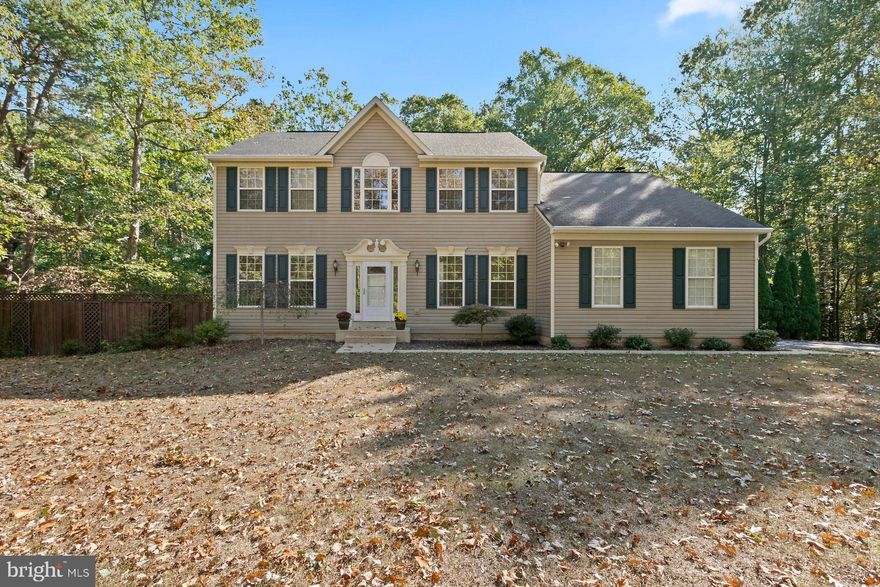 Come home to this beautiful Colonial in desirable Hollywood on peaceful 2 acre wooded lot! Abell's Ridge subdivision includes large private lots with no HOA! Lovely 4 bdrm/2.5 bath home with gourmet kitchen including granite counters, stainless steel applicances and Jen Air down draft gas stove only one year old. Family room has built in bookshelves and cozy fireplace. Newly renovated master bath with soaking tub and tiled shower. The backyard is an outdoor retreat with spacious outside decking and hot tub! So much to offer at such a good price! Won't last...Schedule your showing today!