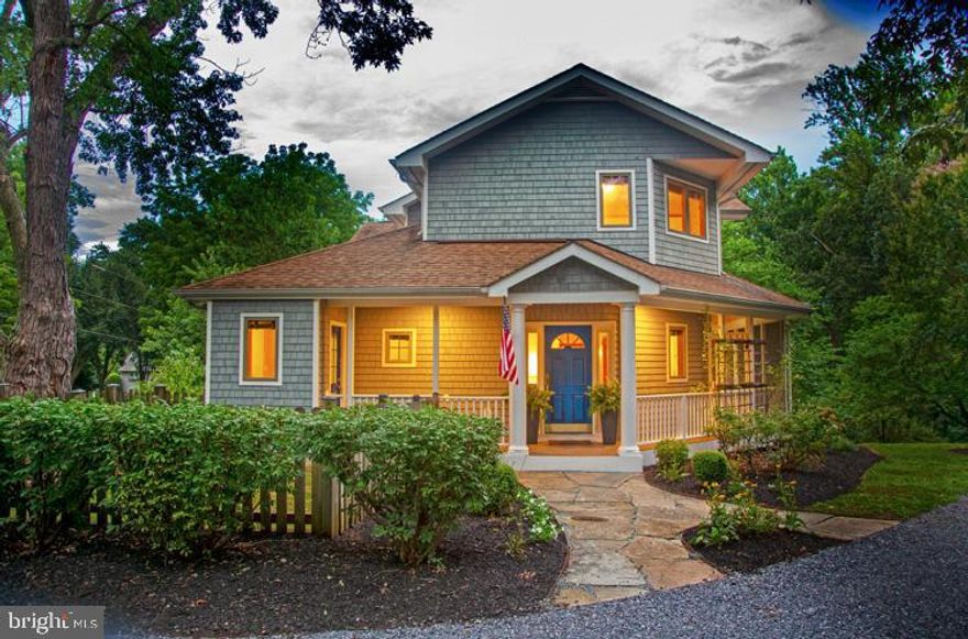 Move In Ready.  Pristine Waterfront Retreat On Protected Weems Creek and beautifully renovated.  This private waterfront sanctuary offers a main house with an open light filled floor plan featuring Ash hardwood floors, two wood burning fireplaces, Cashmere Carerra Quartz Stone Counter Tops, Herringbone Carerra Marble backsplash, Wet bar,  Private Pier with power, water, sundeck and an average depth of 7 feet with approximately 100 feet of living shoreline, room for multiple boats.   Full guest cottage built in 1934 has two bedrooms, new kitchen, hardwood floors, new bathroom and separate parking.  This Nantucket style home has superior outside space with a large deck, balcony off the master suite and wraparound screened in porch on just over an acre of land with native Maryland trees, plants and rain garden.  This Fabulous coastal compound with character, space and timeless flexible floor plan offers a true sense of indoor/outdoor living.  Location is amazing from the dock you can see the Severn River and be in Downtown Annapolis by boat or car in five minutes, easy access to Route 50/97,  BWI Airport, the Capital and so much more.....Chef's kitchen has stainless steel appliances, master suite has heated floors, large walk-in steam shower and separate jetted soaking tub, blue tooth exhaust fan and Juliet balcony.  In addition this home  is part of the Weems Creek Conservancy, established in 1982 to preserve, restore and improve the Weems Creek Watershed in Annapolis and Anne Arundel County.  Custom Built home designed with easy living in mind from the fenced in dog space  and separate wash area for your dog or family and friends coming off the water,  9 foot high ceilings in the lower level with brick wood burning fireplace, and glass doors for light and easy access to the outside, from the exterior spiral staircase connecting the outside living spaces.  This beautiful move in ready home won't last long......More Photos Coming Soon