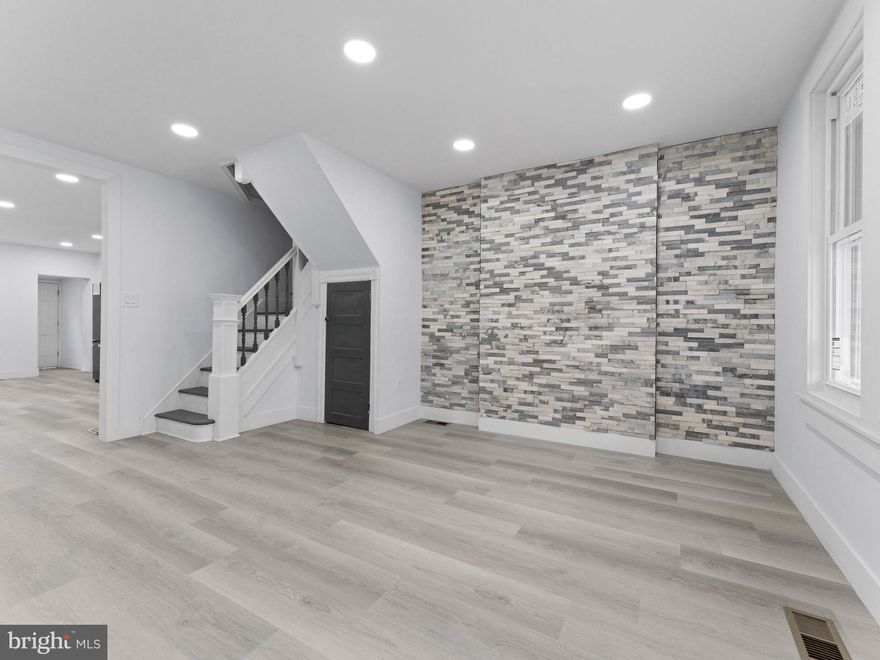 Welcome to 5903 Race St, a fully renovated residence features 3 spacious bedrooms and 1 bathroom home. The main level offers an open and airy living room with a beautiful accent wall, perfect for relaxing or entertaining, along with a dining area and a stylish modern kitchen designed for both comfort and functionality. Towards the back, a conveniently placed washer/dryer hookups, and easy access to a large backyard—ideal for family gatherings, BBQs, or simply unwinding outdoors. Upstairs, you'll discover three sunlit bedrooms with generous closet space and a full bathroom. The full basement provides additional storage or potential for further customization.  Located just minutes from Drexel, UPenn, CHOP, Philadelphia Zoo, Art Museum and more! Easy access to schools, parks, shopping, public transportation, and major roadways, this home offers both comfort and convenience. Don’t miss out—schedule your showing today and explore all this charming home has to offer!