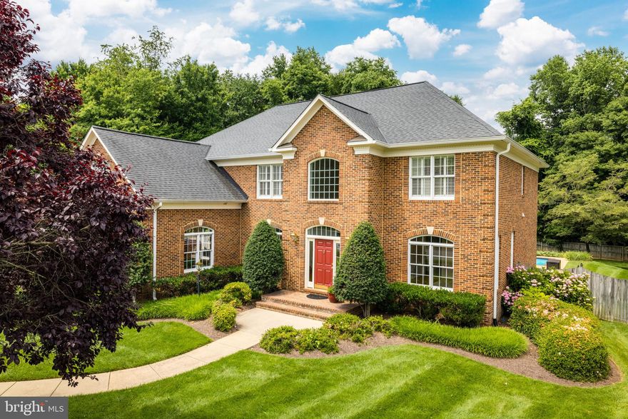 Handsomely sited on a large treed lot, this lovely colonial features approximately 5500 sf of mint condition living including a back porch and a beautiful fenced backyard with a pool.  Enjoy cul-de-sac living just five minutes from Tysons, the Silver Line Metro and the Toll Road.   All three levels have a neutral decor with nine foot ceilings on the main and lower levels.  The open floor floor plan on the main level has great flow for entertaining both inside and outside with back porch, pool and patio. The highlight of the property is the fenced and lushly landscaped backyard with the porch and pool framed by mature trees. The two story foyer with an angled staircase, opens to both the living and dining rooms.  Privately tucked in the corner, is a library with built-ins and great views of the backyard and pool. The dramatic two story great room has a two story stone gas fireplace flanked by four oversized windows.  The adjoining morning room features three angled walls of windows and has a French door to screened porch and access to backstairs.  The updated kitchen has a large eat-up center island, GE Profile stainless steel appliances and a desk nook.  The main level is complete with a beautifully renovated powder room, mudroom and laundry room and oversized three car garage.  The upper level features an huge owners suite with his and her separate renovated luxury baths and a very very spacious closet and dressing area. In addition, there are  three secondary bedrooms and two baths of which one bedroom is an ensuite. The lower level has an expansive recreation room with a brick gas fireplace, a full bath and French doors to a walkup stairwell.  Also, there is a finished storage room with shelving and two large unfinished storage rooms that could be future media and exercise rooms or even a bedroom.