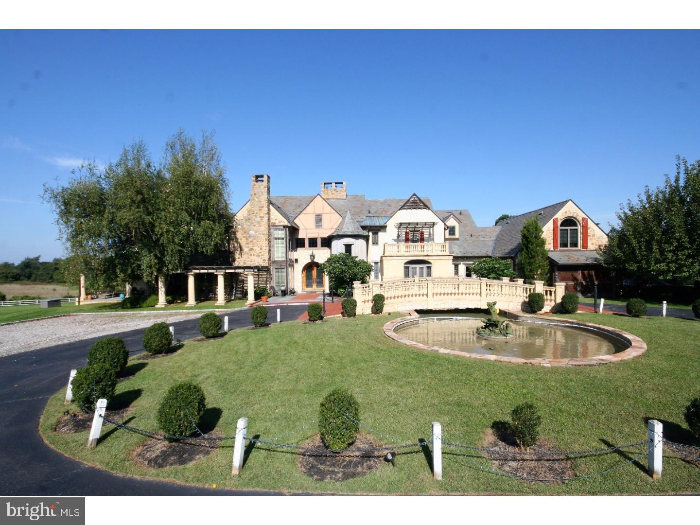 Opportunity of a Lifetime to get lucky, buy a Mediterranian inspired Masterpiece built with Old World European craftsmanship by the Corso Brothers who were trained in Rome, Italy. Handcrafted by over 300 artisans who combined their unparalleled talents that span all the trades. Situated in cul-de-sac on almost 5 idyllic acres in the Heart of Charlestown Township with gated entry, circular drive over reflecting pool, rear pond, 80' swimming pool, full outside kitchen, 3 porches and 5 balconies off each bedroom, Slate Roof with Copper gutters and downspouts...this gem has over $5,000,000 invested, having it ALL outside and so much more within! Aptly named "Tutto Sorrisi" or All Smiles will bring joy to the next keeper of the keys who will immediately see the highest quality materials used throughout this magnificent estate. European architecture artfully blends Imported French Limestone used generously, bronze, Italian marble, wet plaster thru most of home, all solid 1-3/4" thick wood doors(more than 80), 6 fireplaces, Custom millwork with 7" basebords throughout all 3 floors, Custom wrought ironwork, mahogany ceiling in 500 bottle capacity wine cellar(15 x 19) for the oenophile, heart of pine hardwoods in kitchen and family room...the list of spectacular amenities goes on and on and on! The center of all that happens and undeniably the heart of this Masterpiece is the enviable Custom built French Chef's Kitchen with unique back-to-back fireplace, built-in Italian brick Forno oven and eight-burner Godin imported French range, 3 copper sinks, vaulted ceilings and copious custom cabinetry by Harry Wolf of Fox & Wolf in Skippack, sure to satisfy every gourmet. The Breakfast Room(19 x 22) is balanced by 2-sided brick fireplace off Kitchen, Office(11 x 11) off the Library, and the Grand Foyer(18 x 19) for greeting guests are special unique custom features that add this incredible home. There is a 3 car attached garage and a 3 car detached garage with an unfinished suite above to finish for guests or nanny. There's so much more that seeing is believing!