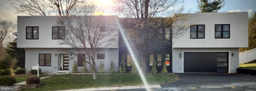 A completely newly renovated, beautiful home built from the ground up!  This wonderful home sits in the heart of Chevy Chase’s Rock Creek Knolls. It features a 5-bedroom, 4-bathroom home with modern elegance, abundant space, and an unbeatable location. The bright open floor plan features the living room's gleaming marble flooring, hardwood floors, and an electric fireplace for cozy gatherings. 
A main-level room and full bath provide flexibility for a home office,  guest suite, or even a yoga studio. 
The gourmet kitchen is a chef’s delight, boasting a huge island, stainless steel appliances, gray marble countertops, a stunning tile backsplash, and ample cabinetry. 
Going upstairs, all five bedrooms feature hardwood flooring, complemented by three beautifully designed spacious full bathrooms. 
On the outside is a huge two-car garage and driveway which gives to lots of parking, while the tree-lined neighborhood offers peace and privacy. Located minutes from Bethesda, Silver Spring, I-495, and the upcoming Capital Crescent Trail, as well as the Purple Line Light Rail. This home provides easy access to top shopping, dining, and commuting options. To top it off, pets are welcome!