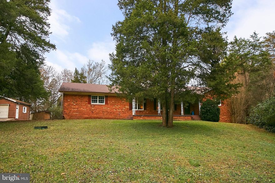 Priced to sell**Lovely & maintained home on 5+ ac.  Kitchen open to family room w/ fireplace & walk-out to deck.  Light-filled front living &dining room. 3BRs on main, incl master w/ bath.  Spacious lower lvl rec room w/ wood stove, a BR, also 2 addt'l rooms can be "BR"/office/crafts, large storage/wine cellar, rough-in for full lower bath.  Mud room/areas on both lvls. New HVAC; roof 8 yrs.