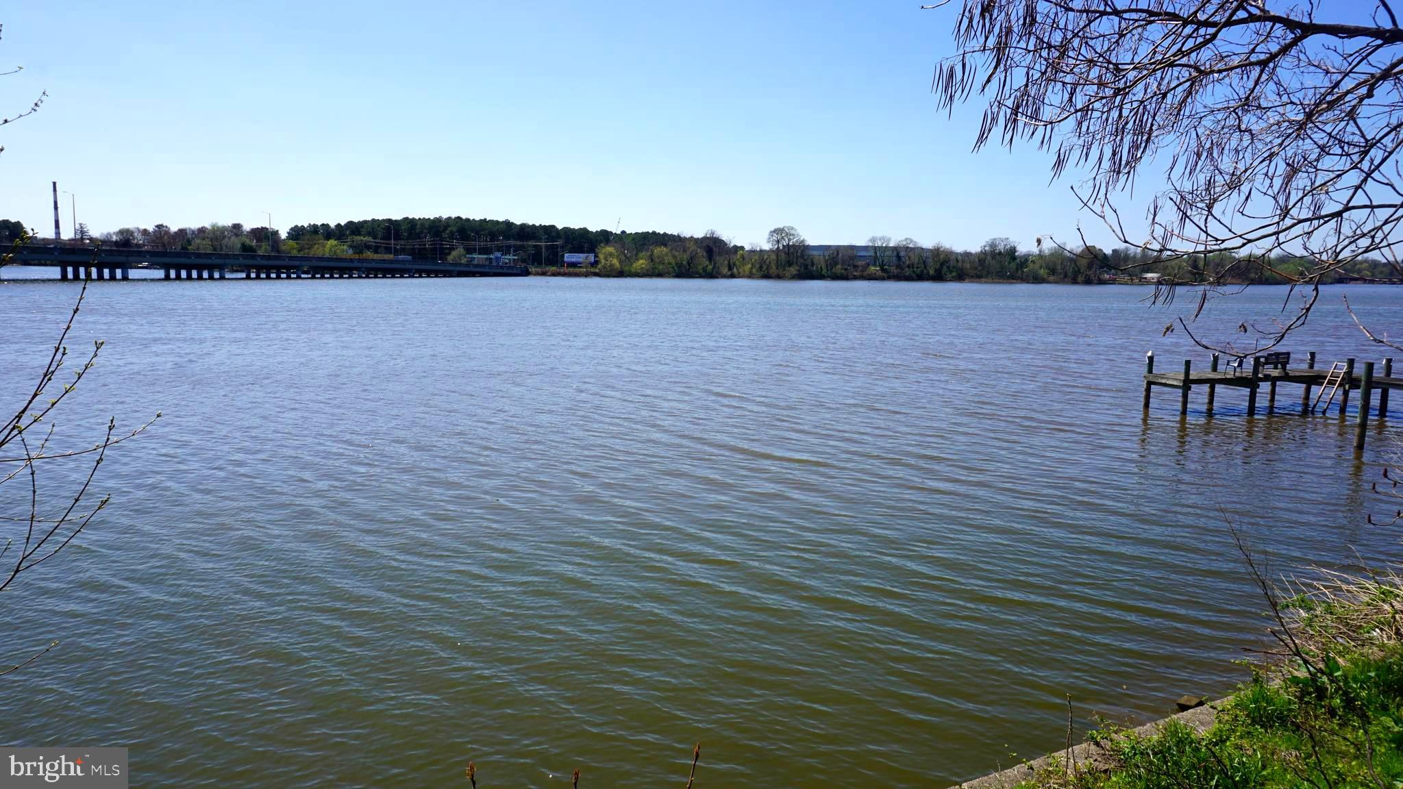 Introducing this rare opportunity to build your Waterfront Dream at an affordable price. The lot is 7500 Sq Ft lot and is located close to the city, commuting routes, public beaches, boat ramps, marinas and local services and restaurants. The views are breathtaking, and the possibilities are endless. If you want to enjoy the waterfront lifestyle without breaking the bank, this is your chance to make it happen. This is a tear down property and entry inside is prohibited. Drive by only due to safety concerns. The Value Is in the Land! Hurry it won't last long at this price! Call for additional details!