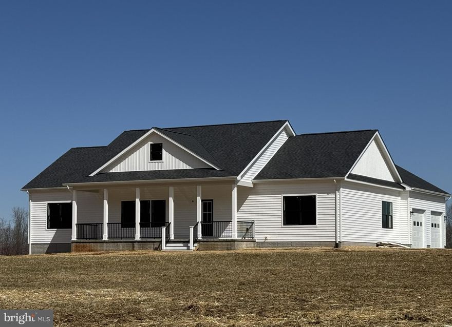 MOVE RIGHT IN!  This new construction rambler boasts over 2000SF of finished living space on the main floor, full unfinished walkout basement, and attached 2-car garage.  Situated on 3.26 acres in beautiful Madison County with close proximity to Route 29.  Modern farmhouse design features a large welcoming front porch, quiet rural setting, and large front & back yard.  Come inside to an open floor plan, neutral color scheme, 9ft ceilings, upgraded trim package, recessed lighting, and LVP flooring throughout the main living area. Fantastic upscale kitchen boasts white shaker cabinets with soft close hardware, gorgeous quartz countertops, pot filler, subway tile backsplash, large island with bar seating, stainless appliances, walk-in pantry featuring lots of storage, and a separate dining area with access to the rear deck for outdoor entertaining. Private owner's suite has a walk-in closet and luxury bath with a huge walk-in tile shower and double vanity. Two additional nice-sized bedrooms share a hall bath with a tub shower. Don't miss the mudroom/laundry room entry from the garage with a great "drop zone" area.  The basement level has lots of potential for additional future living space, including rough-in for a full bath.  No HOA or restrictive covenants.  High-speed StarLink service available.  Floor plans available upon request.