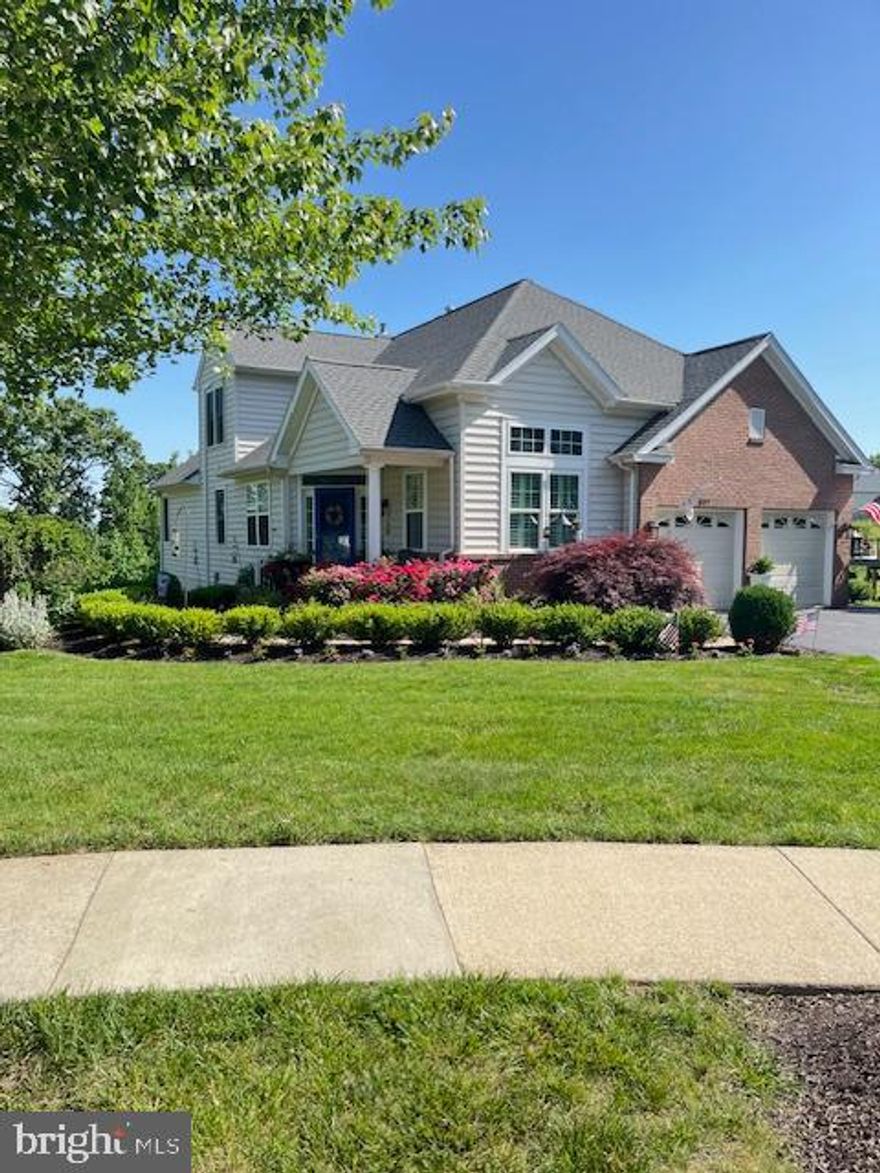 Welcome to 527 Gilmer Rd in the highly sought after "Villages at Hillview" an active 55 plus community!  Gorgeous perennial gardens and scrubs greet as you enter a front covered porch and step into a fabulous floorplan with a large and inviting Dining Room, a discretely situated 1st floor office, a Chef's Dream Kitchen featuring Thermador Stove and Oven, Thermador Dishwasher, Stainless Steel Refrigerator and microwave, Kraftmaid Custom Cabinetry and a center island for easy entertaining both small and large gathering. The eat -in kitchen overlooks the Great Room with cathedral ceiling,  a wall of custom Built-ins showcasing the beautiful gas fireplace, one of two fireplaces, hard wood floors, and new sliders to a perfectly sized deck offering some of Chester County sunsets and open space of nature at it finest! A 1st Floor Primary Suite offers beautiful decor in wallpaper, custom window treatments, walk in closets and a new custom bathroom with new glass shower enclosure, double sink vanity and gorgeous and classic tile work. A half bath, first floor laundry, a pantry and a two car garage that steps into the mudroom/laundry for ease and convenience complete the first floor.  The lower level complements the meticulously well loved and cared for home, please note the Custom finishes including a gas fireplace, exercise room (another bedroom) craft room, kitchenette with a mini fridge and sink, subway tile and white cabinetry, recessed lightning, a full bathroom that could be featured in Better Homes and Gardens,  sliders to the new custom paved patio, perennial award worthy landscaping, whole house generator and a community that offers: pickle ball courts, tennis courts, pools, inside and outdoor pools ( salt water), books clubs, bocce, club house, and so much more! Located minutes to Rt 30 and 202.  Welcome Home!