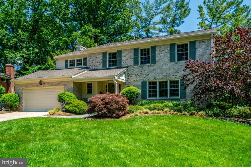 Pristine 4-sided brick home tucked away on a private cul-de-sac and meticulously maintained throughout. The main level offers a spacious formal living room and dining room with crown molding and gorgeous hardwood floors. The kitchen has been beautifully remodeled featuring high-end cabinetry, newer appliances, a center island, and a breakfast area open to the cozy family room with gas fireplace and built-ins. A sliding glass door gives easy access to the private deck and access to the lush backyard.   Upstairs you’ll find a generously sized primary suite with a custom closet and an updated bath with double vanities and a walk-in shower.   The other three bedrooms are considerably larger than most with custom closets and there is another fully renovated bath. The unfinished walkout basement offers endless possibilities with windows for natural light and a rough-in for a future bath. Major updates include roof (2023), HVAC (2020), Anderson replacement windows and a sliding glass door. Ideally located with easy access to I-66, I-495, and Route 7, just minutes to Arlington, Falls Church City, Reagan National Airport, DC, shopping, and restaurants.