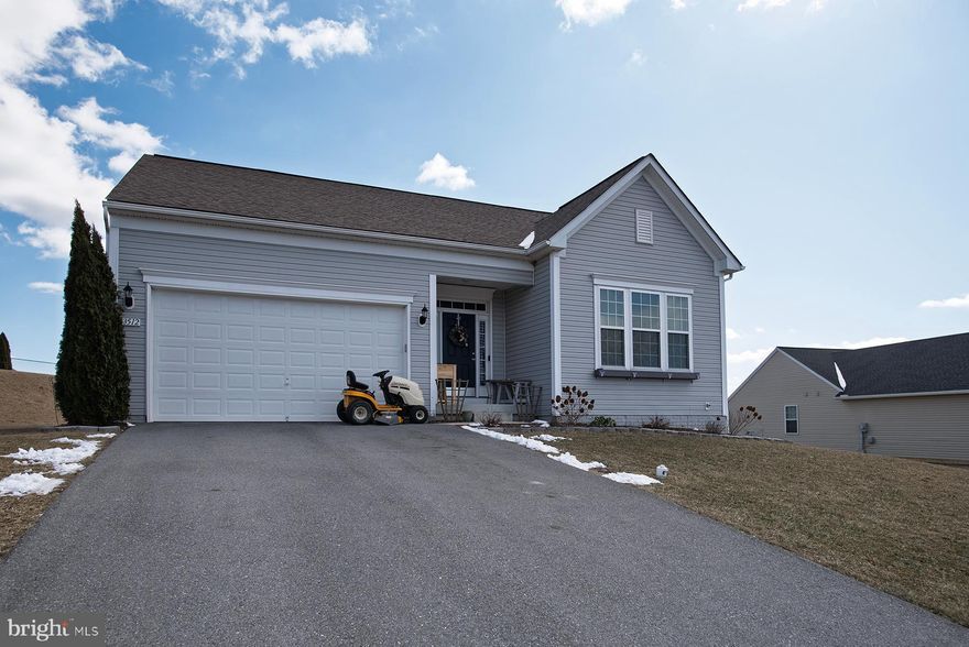 Beautiful 3 bedroom, 2 full bathroom rancher built in 2018, located in the highly sought-after Mountain Shadows community! Enjoy a great view of the mountains!  Step inside to a spacious foyer that leads to two well-sized bedrooms and a full bathroom. Continue down the main hall, where the home opens into a bright and inviting family room featuring a gas fireplace, seamlessly connecting to the dining room and kitchen—perfect for gatherings! The kitchen includes an island, ample cabinet space, a sliding glass door to the backyard, and all appliances are included.  The primary suite offers a walk-in closet and a generous en-suite bathroom complete with a double vanity, soaking tub, and separate shower. A convenient laundry/mudroom is located off the attached two-car garage for added functionality.  Enjoy the comfort of central heating and cooling.  The expansive unfinished basement provides endless possibilities! With plumbing rough-ins for a full bathroom and an egress window well with a ladder, it’s ready to be finished into multiple rooms including additional bedroom if desired. Convenient to I-81, shopping, restaurants and schools. Don’t miss this opportunity to own a wonderful home!