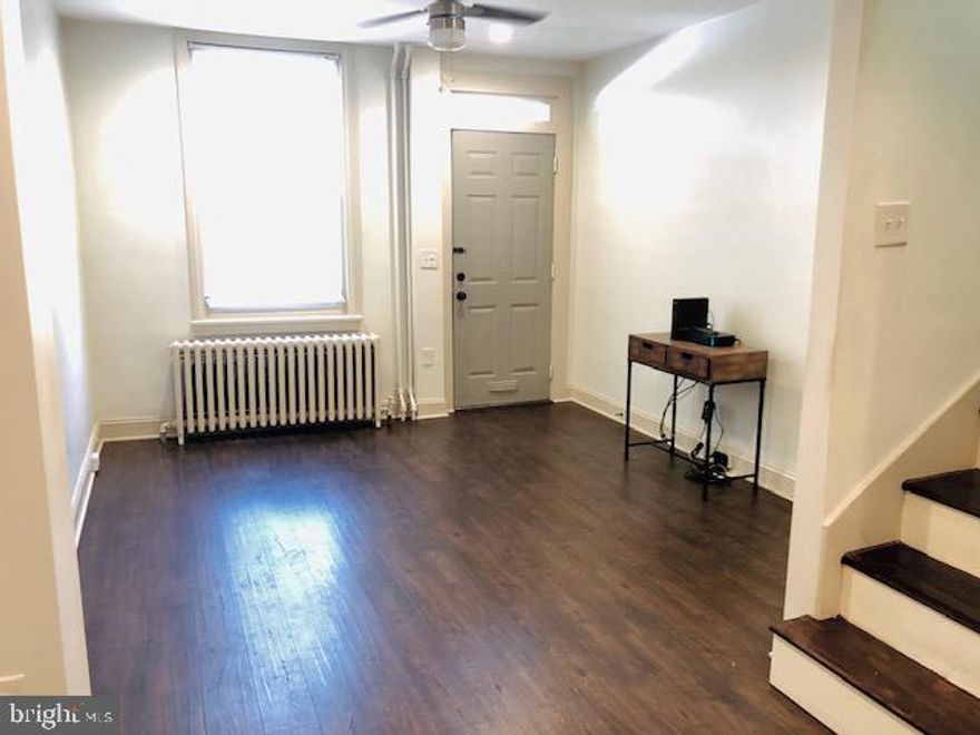 Available May 1st. Friendly, quiet block in walking distance to Fishtown and Northern Liberties. This two bedroom turn of the century home has an open living and dining room, galley style kitchen, a small private yard, a beautiful custom tile bath with glass enclosed shower on the 2nd floor, gas cooking and radiator heat, recessed lights and ceiling fans, and basement storage. Cat-friendly with $200 non-refundable pet fee. Private rear yard. Tenants are responsible for all utilities. Water will be billed to tenant monthly. ------ Requirements: Applicants to make 3x the monthly rent in verifiable net income, credit history to be considered, no evictions within the past 4 years, and must have a verifiable rental history with on-time rental payments. Exceptions to this criteria may exist under the law and will be considered.