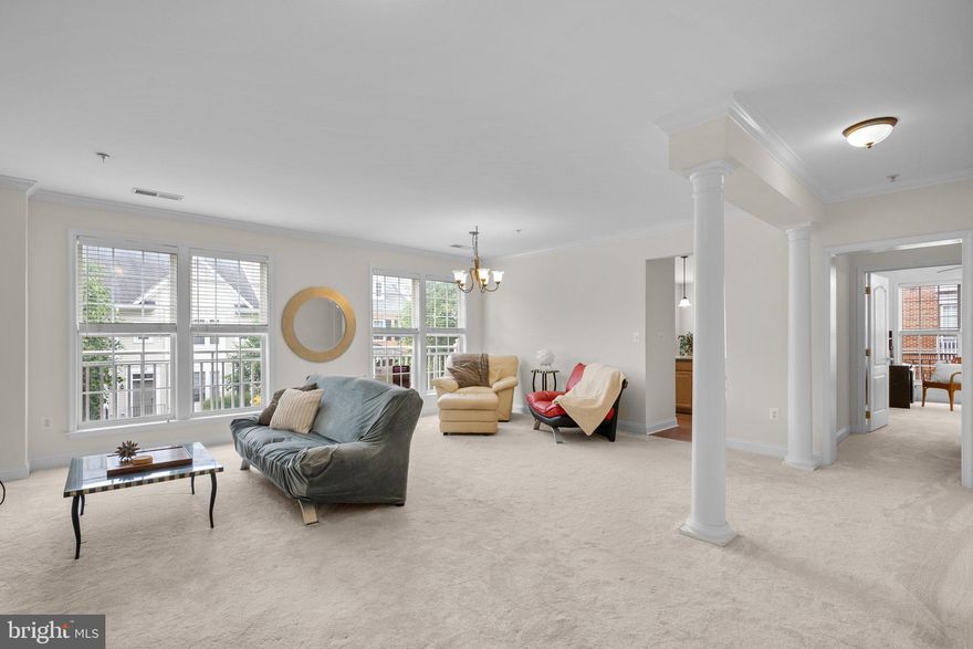 Very Spacious 2 bed,  2 bath condo, open foyer into OPEN living and dining area.  Enjoy a big Eat in kitchen with island.  This corner unit has lots of windows and natural light. Easy access to elevator.  Laundry room with storage in the condo unit. Two assigned parking spaces. The King Farm community offers two pools (with a membership), tennis, walking and biking paths, basketball courts, a dog park, and a community center with gym. Walking distance to Safeway and the Village Center. Two assigned parking spaces and plenty of guest parking. You are within walking distance to King Farm's fine dining and shops. Free Community Shuttle to/from Shady Grove Metro. Just minutes from 270, the ICC, and 355 and less than a mile to the Red Line.