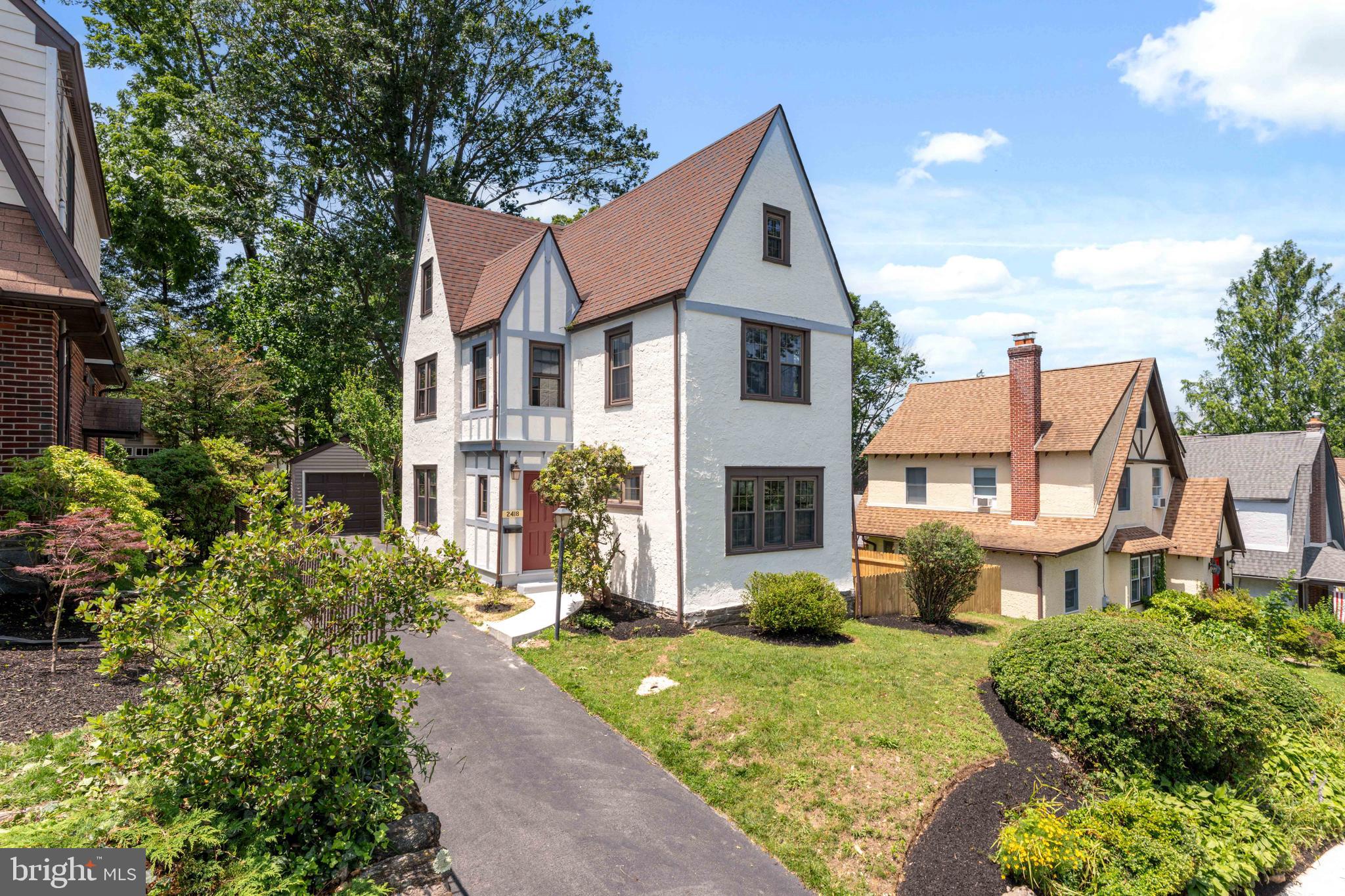 Welcome to 2418 Rosewood Lane, fully renovated, turn-key luxury in the Heart of Havertown. This is the one you've been waiting for. Nestled in one of Havertown’s most cherished neighborhoods, this 4-bedroom, 2.5-bath Merwood Tudor has been completely reimagined—offering the perfect blend of classic charm and modern sophistication. From top to bottom, no detail has been overlooked. The home features a stunning, fully expanded kitchen with high-end finishes, sleek custom cabinetry, and designer fixtures—perfect for both everyday living and entertaining. The first-floor den makes an ideal home office or cozy retreat, while spacious living and dining rooms boast original architectural details thoughtfully preserved and enhanced with today’s design sensibilities. Upstairs on the second floor, 3 generously sized bedrooms are complemented by a beautifully renovated full bath. On the 3rd floor, a 4th bed full suite with its own private bath—perfect for guests, a home studio, or a luxurious primary retreat. Outside, enjoy a lush backyard oasis, detached garage, and driveway parking, all offering both comfort and convenience. From the refreshed exterior to the flawless interior finishes, this home is truly turn-key and move-in ready. This is a unique opportunity to own a fully updated, show-stopping property in one of Haverford Township’s most treasured locations. Walk to schools, parks, playground, public transportation, shops and restaurants in just minutes. Truly a one-of-a-kind home in Haverford Township. Make your appointment today before it’s too late!
