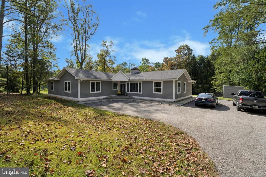 Welcome to this beautifully remodeled ranch home, perfectly situated on a nearly one-acre level lot set back from the road for added privacy. Located in the heart of the Main Line and within the award-winning Radnor School District, this 4-bedroom, 3.5-bath residence offers sophisticated one-floor living at its finest. Step inside to discover soaring 10-foot ceilings and a bright, open floor plan filled with natural light. Every inch of this home has been thoughtfully redesigned with high-end finishes, blending modern style and timeless comfort. The stunning kitchen, elegant living spaces, and luxurious baths reflect exceptional craftsmanship and attention to detail throughout. Enjoy the ideal combination of tranquility and convenience—just minutes from premier shopping, dining, and major commuter routes. Experience Main Line living redefined—where quality, comfort, and location come together beautifully.