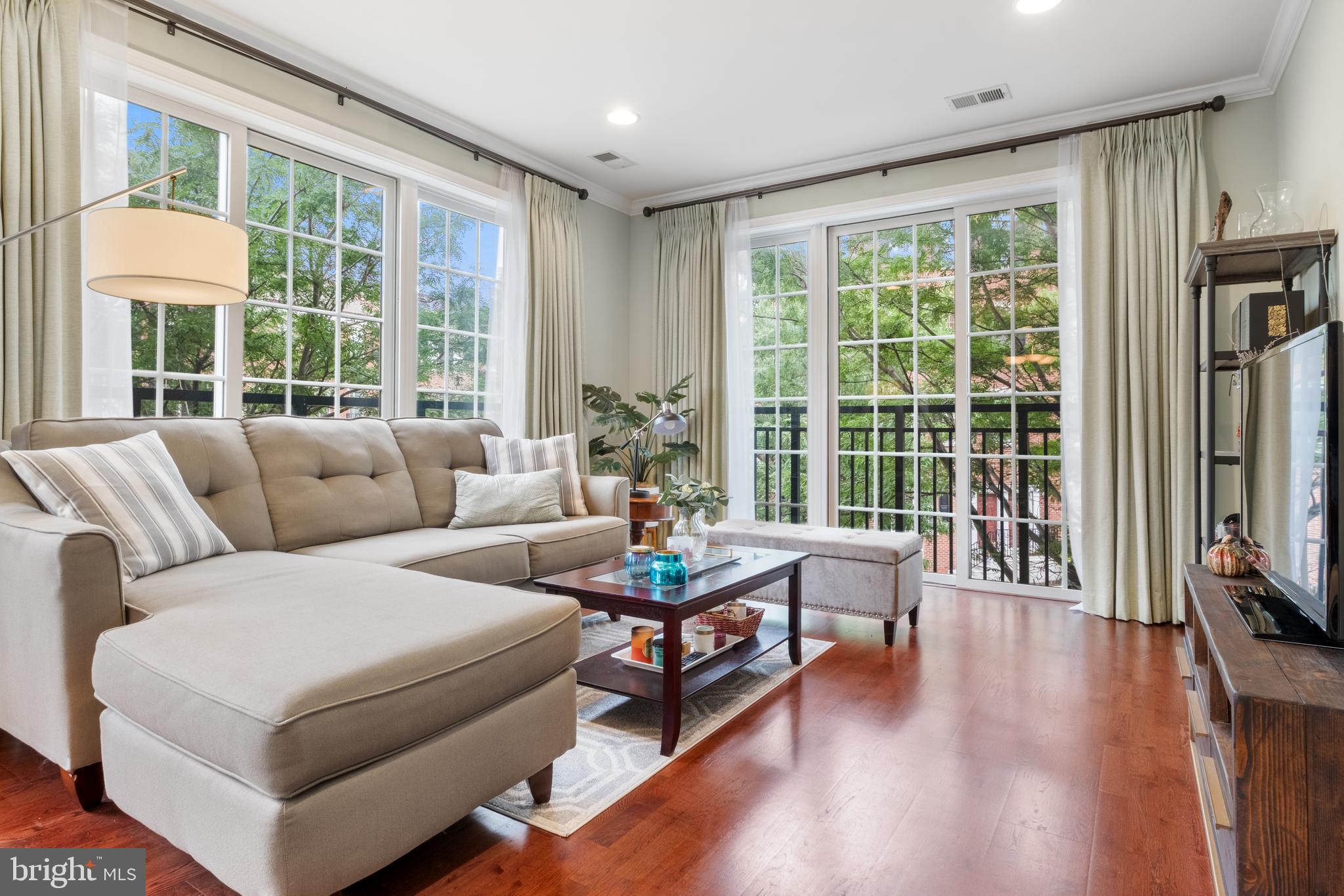 Discover the epitome of luxury living at 600 Commodore Court #2615, a remarkable condominium nestled in Philadelphia’s prestigious Naval Square community! This meticulously maintained 2 bedroom/2 bath sought-after/ rare corner unit includes both garage parking + storage! Located on the second floor in highly desired Addison Manor, you will be surrounded by beautiful lush greenery.
This beautiful home boasts hardwood floors throughout. An elegant entry foyer leads to a gourmet kitchen with generous island, shaker-style cherry cabinetry, glass tile backsplash, granite counters & stainless Whirlpool Gold appliances. Kitchen with island + built-in wine fridge, opens to expansive living and dining area, perfect for comfortably entertaining large parties. Enjoy the sunshine all day long with north/west exposure, stunning views of the beautiful new CHOP towers and plenty of trees just outside the Juliet balconies. Gorgeous window treatments, custom paint & hardwood floors are throughout the entire home. Serene primary suite boasts an oversized walk-in-closet, luxe en-suite bath with dual sinks, soaking tub, separate stall shower, and granite & tile upgrades. Well-proportioned second bedroom could be easily used as a bedroom, office or den. Beautiful carrara marble & subway tile hall bath & separate laundry closet with side-by-side washer/ dryer complete the space. Large coat closet in the entryway provides an abundance of storage in addition to the separate storage locker (3'X6'X9') also included in the building. Garage parking space #9 is located close to the elevator and allows direct elevator access from the garage floor to your unit floor. Naval Square also has abundant visitor parking spots for guests.
Enjoy the ease of having the pool & state-of-the-art fitness center directly across from your building and the concierge close by. The dramatic community room in the Biddle Hall rotunda is perfect to reserve for private parties. Enjoy the outdoor amenities of the 20-acre park-like setting: including picnic areas, well-kept gardens & mature landscaping. With a gated entry and on-site visitor parking, convenience and security are paramount. Very close proximity to South Street Bridge, UPenn (0.7 mi), CHOP, HUP & Drexel, Rittenhouse (0.9 mi) & Fitler Square. Fantastic restaurants and cafes, such as Rival Bros Coffee, Friday Saturday Sunday (James Beard Winner), Illata BYOB, Pub & Kitchen, Southgate, Sabrina's & Loco Pez, are all just steps outside the gates. The new Heirloom Market by Giant and South Square Market are only a block away. Directly out the back gate you will find easy access to the Schuylkill River Park, including the Award Winning Trail & Boardwalk, Markward playground, Tennis Courts & dog park! Naval Square is a pet friendly community allowing up to 2 pets with no weight restrictions. Don't miss this rare opportunity to own a piece of urban paradise in one of Philadelphia's most sought-after neighborhoods! There is a Special Assessment with approximately 9 months remaining. Preferred closing is the first week in June.