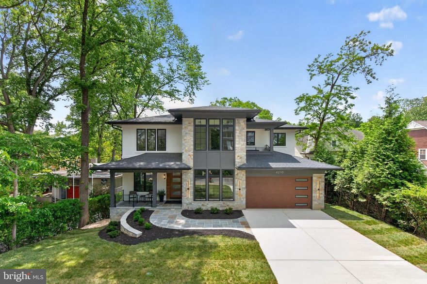 2026 Newly Built  8 BR / 7.5 BA custom modern dream home with stucco & stone exterior sited on 11,375 SF lot in coveted Glen Echo Heights neighborhood. Thoughtfully designed for the nature enthusiast, this home brings the outdoors in through sweeping balconies and expansive decks showcasing breathtaking treetop views. Meticulous high end designer finishes and amenities throughout including  10 FT ceiling on both the main floor and lower level and 9 FT ceiling on the upper level.  8 FT interior doors throughout.
Lower level is above ground with FULL DAYLIGHT and walk-out to rear deck overlooking large yard. 
Home features an open floor plan with Andersen casement & picture windows, white oak hardwood floors, modern staircase, and custom built-ins throughout.
Gourmet kitchen features large waterfall quartz island, 48" Wolf gas stove, 48" Subzero refrigerator, Bosch dishwasher and Zephyr wine fridge in butlers pantry. BONUS: Hidden 2ND Kitchen w/ 2nd fridge, sink and dishwasher plus cabinet storage! 
Spacious Dining room features dropped ceiling with accent lighting and linear chandelier. 
Both Breakfast room and Family room (w/ coffered ceiling & linear fireplace) opens to porch
In-Law suite (or office) with full bath on first floor. Mudroom with washer/dryer, sink and built-in bench with cubbies. Household room with built-in desk and library lighting. Primary Bedroom is a private oasis with a linear fireplace coffee bar and balcony with magnificent view.  Stunning Primary Bath with radiant heated floor, soaking tub and large shower w/ bench. Oversized fitted closets throughout.
Recreation room with built-ins, linear fireplace, custom bar with beverage fridge, dishwasher and wine closet. Generous backyard offers endless possibilities - whether for entertaining or the addition of a future pool or sports court.. SIMPLY GORGEOUS!!!!