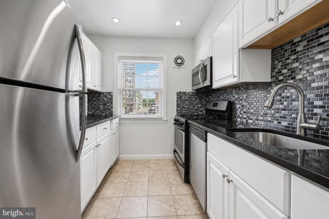 Photo of 9471 Fairfax Boulevard #301, FAIRFAX, VA 22031 (MLS # VAFC2008594)