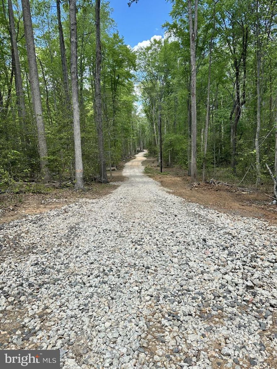 This beautiful Lot is a 5 Acre Rural Retreat with mature hardwood trees!  The driveway and house site have been cleared!  The entrance has been graveled to house site.  950' of silt fence has been installed.   This lot is ready to go to build your dream house here with NO HOA.  Within the Spotsylvania County Schools, this area would attend Chancellor Elementary, Ni River Middle and Riverbend HS.  Conveniently located to shopping, commuter lots, restaurants, and entertainment.  If you like water sports, the Hunting Run Reservoir dock is just 5 minutes from here.  For kayakers, there are 3 put ins and take outs on the Rapidan or Rappahannock Rivers just 10 minutes drive from the property.  Surrounding National Battlefields provide plenty of miles of hiking, biking and history!  Of course, with all the surrounding waterways and reservoir, the property is in the River and Reservoir Protection Overlay Districts.   Soil Study done by M&M Consultants in Documents section.  Perks for a 3 Bedroom semi-conventional septic system but with an upgrade could perk for 4 BR.  See documents for boundary survey, foundation soil report by Geo Terrain, Dominion Energy Easement agreement and other important information.