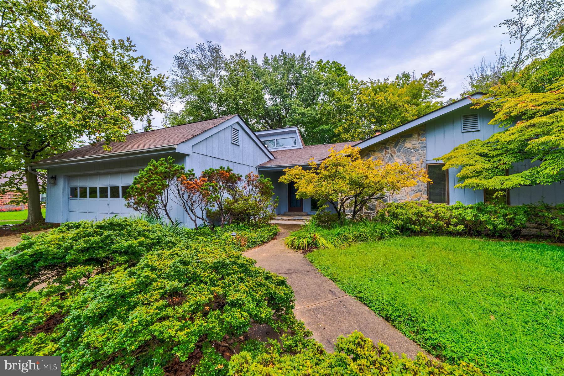 Beautiful mid century modern style home complete with an atrium. This one level ranch style home does not lack character. The open living room and dining room areas are perfect for entertaining with a view of the atrium and the golf course out back. The kitchen was recently updated within the past 5 years with lots of extra storage and a built in table. Two wood burning fireplaces complete the living areas. Three generous size bedrooms are down the hall with 2 large bathrooms. In the garage, there is ample handmade storage and a freezer, perfect for extra food storage. The roof is less than 10 years old and the home was painted around 5 years ago. This is one not to miss! Home has been well cared for and being sold As-Is