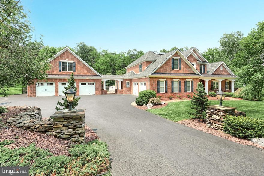 OPEN HOUSE CANCELLED AS HOUSE IS UNDER CONTRACT . 
Welcome to 471 Shady Dell Road, a one-of-a-kind custom-built all-brick estate located in the highly sought-after Rosenmiller Farms community within the York Suburban School District. Designed and built by Jeffrey Henry, Inc., this beautifully crafted home sits on 1.5 private, landscaped acres and offers over 8,700 sq ft of finished living space, plus an additional 1,120 sq ft of finished bonus space above the detached garage. With 6 bedrooms, 5 full and 2 half bathrooms, the layout was carefully planned to ensure every space has a purpose, and no detail was overlooked. The main level features a formal dining room with crown molding, a vaulted family room with wood-burning fireplace, two custom home offices, a Florida sunroom with American chestnut beams, and a fully updated chef’s kitchen with granite counters, Sub-Zero refrigeration, Miele coffee system, warming drawers, and dual dishwashers. The first-floor primary suite includes a spa-like bath with soaking tub, dual vanities, and walk-in closet. Upstairs offers additional spacious bedrooms and a second laundry area, while the fully finished walkout basement functions as an additional level of the home, featuring a second full kitchen, theater room with 7.1 surround sound, fitness area, and expansive recreation space. Outside, enjoy a heated in-ground pool with solar assist and waterslide, a Brazilian Ipe deck, a covered patio with a marble fireplace, and a full outdoor kitchen with Wolf grill and copper hood. A poolside cabana with laundry adds convenience. A newly installed perimeter fence encloses the backyard and pool area—perfect for peace of mind and pets to roam freely. Additional features include 5-zone geothermal HVAC with radiant floor heat (15 zones including garage bays), passive solar water heating, 600 AMP electric service, 20KW natural gas backup generator, a recently upgraded full-home LED lighting, a 16-camera security system, heated 2-car attached garage, detached 3-car garage with finished upper level, and 8+ spaces of driveway parking. A rare blend of function, comfort, and exceptional craftsmanship—this home offers everything you could want in a custom estate.