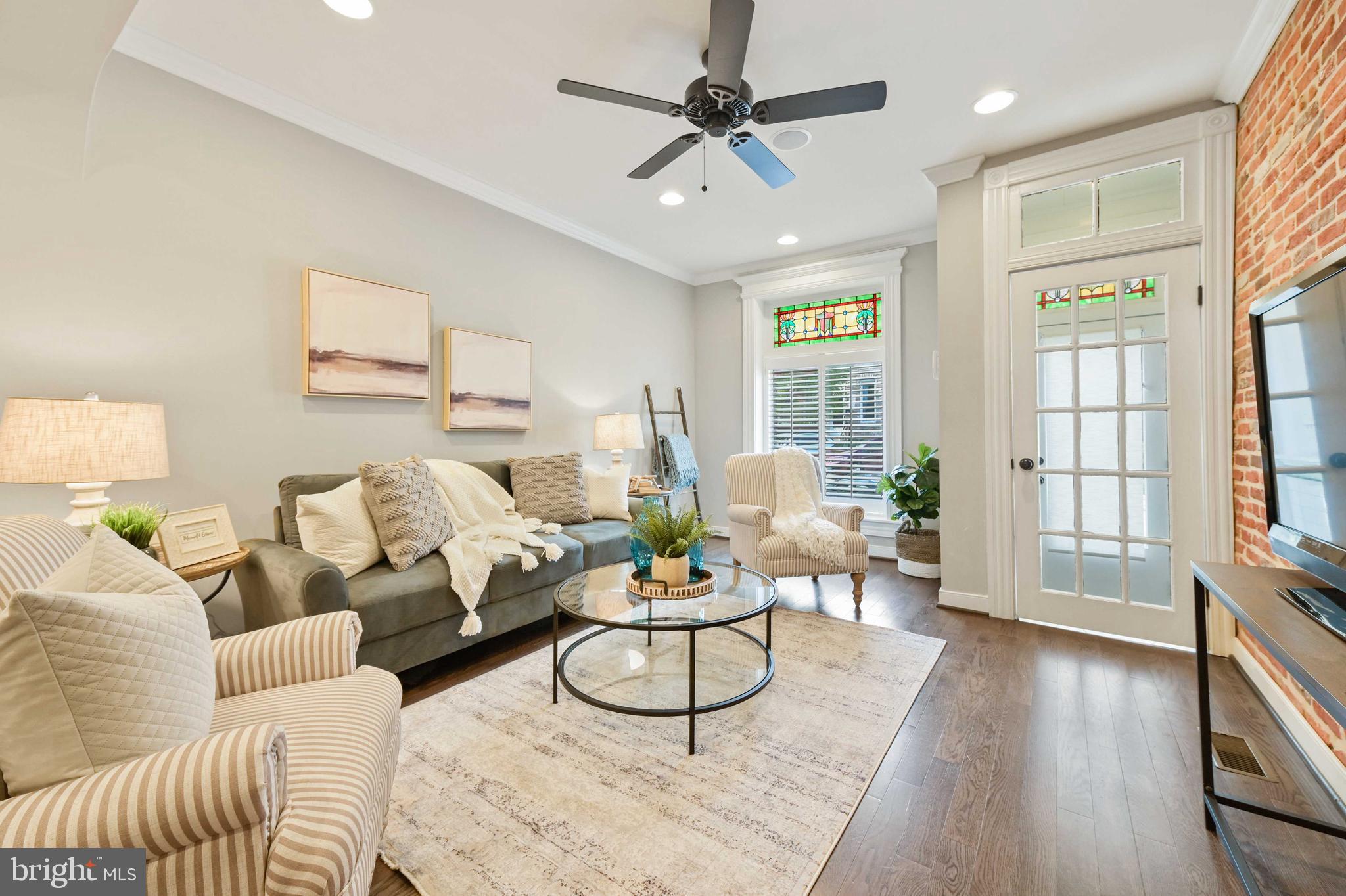 STUNNING CHAP RENOVATION LOCATED IN THE HEART OF CANTON ON EXTREMELY SOUGHT AFTER BLOCK WITH OVERSIZED OFF STREET PARKING PAD. GLISTENING HARDWOODS CASCADE THROUGHOUT. ENJOY CUSTOM WHITE CABINETRY, UPGRADED TRIM AND PAINT PACKAGE, IMPORTED TILE, COFFERED CEILINGS, GRANITE COUNTERTOPS, SS APPLIANCES IN DESIGNER CHEF'S KITCHEN. TONS OF NATURAL LIGHT. FINISHED LOWER LEVEL. HIGH CEILINGS. TONS OF STORAGE. WALK-IN SHOWERS. WALK-IN CLOSETS. WHOLE HOUSE AUDIO. SPACIOUS 4 BEDROOMS WITH 3 FULL BATHROOMS. EXPANSIVE ROOF DECK WITH INTERNAL ACCESS FOR ENTERTAINING - AMAZING WATER AND CITY VIEWS. ROUGHLY 5 YEARS REMAIN ON CHAP TAX CREDIT. CLOSE PROXIMITY TO RETAIL SHOPPING, LOCAL DINING, PATTERSON PARK, AND ALL MAJOR HIGHWAYS. SCHEDULE A PRIVATE TOUR TODAY.