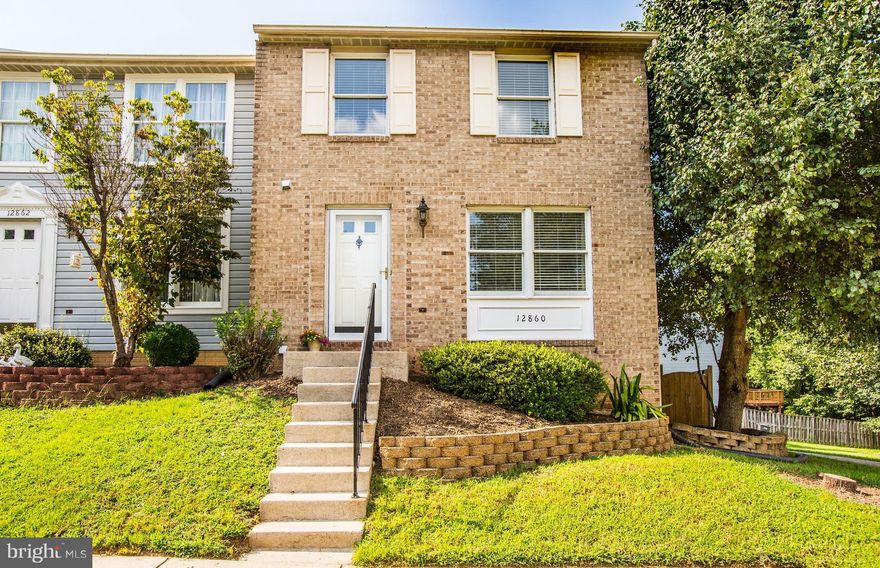 Multiple Offers Being Reviewed*Beautiful 3 Level Contemporary Brick End-Unit! 2 Spacious Bedrooms Up:Each with a Full Bath on Upper Level*Open Floorplan w Living,Dining,Kitchen & Sunny Breakfast Rm opening to a Private 24'x16' DECK overlooking Treed Reserve*Stairs to FENCED Yard*Lower Family Room wWoodburning Fireplace & Walkout! Large Storage/Workshop & Laundry Rm*Walk to Pool/Tennis/TotLots/