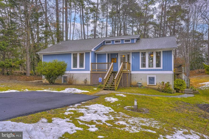 Welcome home to this beautifully updated custom-built home in the sought-after Drum Point community, a charming water-oriented neighborhood offering a true coastal lifestyle. Offering over 2,500 sq ft of living space, this thoughtfully designed and meticulously maintained home features cathedral ceilings, custom windows throughout, and a beautifully updated kitchen that blends style and functionality. With two spacious primary bedrooms—each with its own full bathroom—this layout is ideal for flexible living arrangements or hosting guests comfortably.  Major upgrades include a newer roof and newer HVAC system, giving peace of mind for years to come. Step outside to enjoy a huge deck overlooking the fully fenced backyard—perfect for entertaining, relaxing, pets, or outdoor fun. An expanded driveway provides ample parking, while the home’s custom details and modern updates make it truly one of a kind. Just moments from the Chesapeake Bay, this property offers the perfect blend of comfort, style, and neighborhood charm.