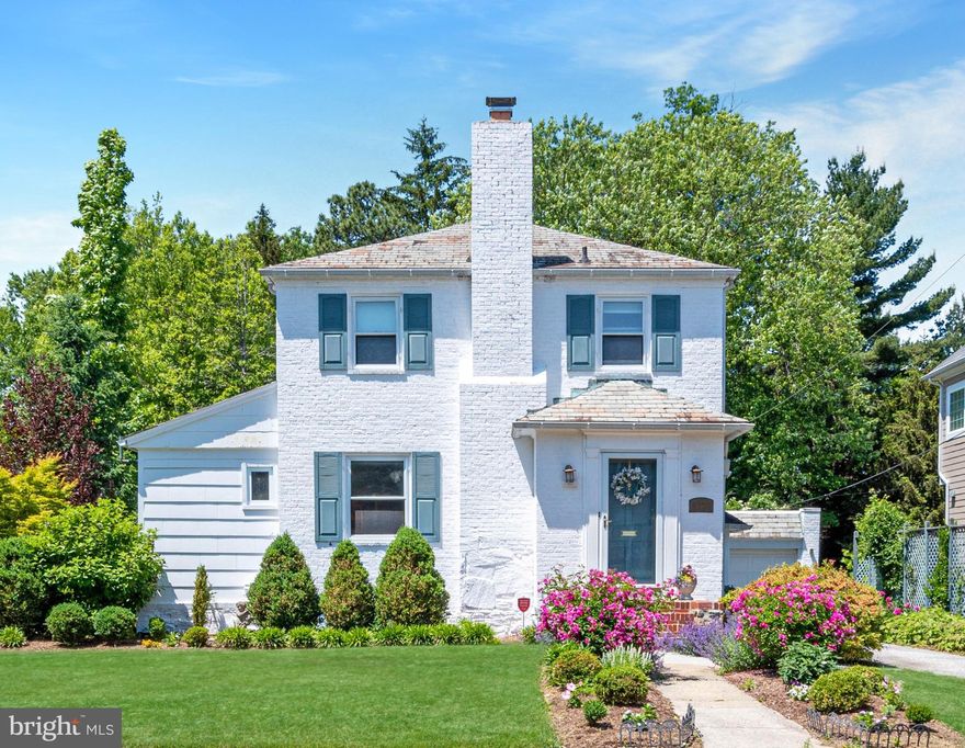 Brick Colonial Style Home with a Detached Garage, Features a Private Back Yard and Garden in the Desirable "Pinehurst" Neighborhood. The home includes 2,364± total square feet, 3 bedrooms, 2 full/1 half baths, a finished lower level and is situated on a private 0.22± acre lot. The home has been lovingly maintained and cared for by the current owner. The main level of the home includes an entry foyer, living room with a fireplace, an eat-in kitchen, a formal dining room with sliders that lead to a deck, an office, and full bath. The upper level includes 3 bedrooms and 1 full bath.  The lower level of the home is finished and includes a large recreation room with a stone fireplace, storage/utility area with laundry, and a half bath. Additional  features include wood floors throughout, driveway with ample parking and detached garage, deck, and private fenced-in backyard and beautiful gardens.