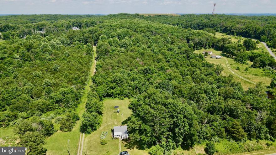 ***Property is Zoned as AR-1.  This property is also listed as land under MLS ID VALO2098034***

Set on over 10 scenic acres just minutes from historic downtown Leesburg, 20638 Gleedsville Road offers a rare opportunity to own a substantial parcel in one of Loudoun County’s most desirable and picturesque locations. Surrounded by rolling hills, mature trees, and open skies, this expansive property is ideal for those seeking space, privacy, and the freedom to create their own vision—whether it’s building a dream home, establishing a private retreat, or investing in a versatile landholding with long-term potential.

The land features a mix of open and wooded areas with gently rolling terrain, offering multiple potential homesites and endless possibilities. With no HOA restrictions, the property invites creative use—from equestrian facilities and hobby farming to a custom estate or peaceful rural getaway. There is also a small 1-bedroom, 1-bath house currently on the property.

Located just 5 minutes from downtown Leesburg, the property blends countryside tranquility with convenient access to shops, dining, and entertainment. Enjoy nearby destinations like Morven Park, the W\&OD Trail, and a wide selection of acclaimed wineries and breweries including Stone Tower Winery, Vanish Farmwoods Brewery, and Walsh Family Wine. Dining options abound with local favorites such as Tuscarora Mill, The Wine Kitchen, and Fire Works Pizza.

For commuters, Route 15, Route 7, and the Dulles Greenway provide efficient connections to Reston, Tysons, and Washington, DC. Dulles International Airport is approximately 25 minutes away, making travel simple and accessible.

With its prime location, breathtaking scenery, and unmatched potential, 20638 Gleedsville Road offers the perfect canvas to bring your vision to life in the heart of Loudoun County.