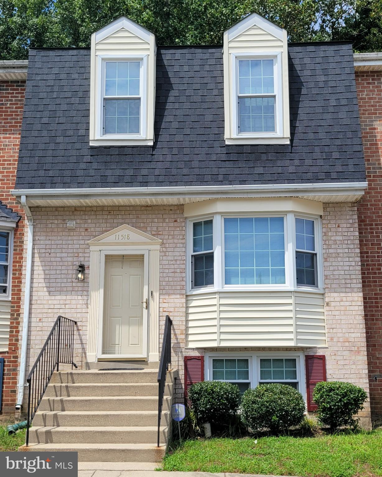 Come and fall in love with this well maintained and spacious townhouse!!! Features include hardwood floors, updated bathrooms & kitchen with granite counter tops and stainless steel appliances and a large deck perfect for entertaining. Main level – living room, dining room, coat closet and a half bathroom. Upper level - two master bedrooms with, full bathrooms and a linen closet. Lower level - fully finished walk out basement, bedroom with walk-in closet, full bathroom, recreation/family room, laundry room (washer & dryer) and a storage room. There is a new hot water heater, updated HVAC unit, new carpet and roof, windows and sky light were replaced in 2018.