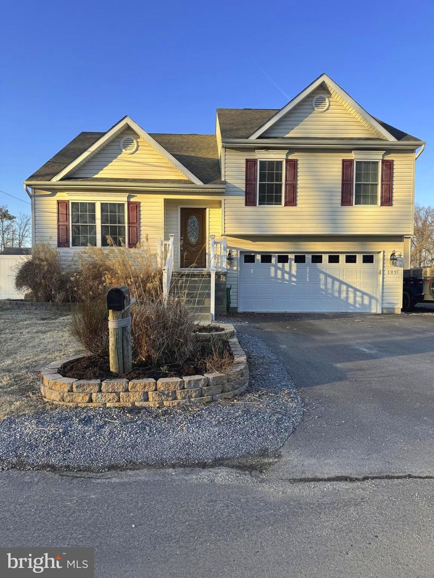 Professional pictures will be uploaded Friday afternoon.  Welcome to 109 Price Lane, a beautifully maintained original-owner split foyer home built in 2013. This home offers comfort, space, and convenience in one of the Eastern Shore’s most popular locations—Kent Island.

This 3-bedroom, 2.5-bath home features a bright, open layout with hardwood flooring in the entry, family room, kitchen, and hallway. The kitchen offers tall cabinetry, granite countertops, a classic stone backsplash, and an eat-in area with access to the maintenance-free second-level deck.

The primary suite includes a full ensuite bath, while two additional bedrooms and a full hall bath complete the upper level. 

The finished lower level offers a second living space, laundry, half bath, and access to both the garage and backyard. Outside, enjoy white vinyl fully fenced yard, stamped concrete patio, and a stand out feature of a 12 x 16 climate-controlled shed/workshop with electric—perfect for hobbies, a home office/studio, gym or flex space. The extended driveway provides ample parking for multiple vehicles, boats, or guests.

Enjoy no HOA and a prime location less than a mile to the grocery store and minutes from the vibrant Kent Narrows, known for waterfront dining, dock bars, and entertainment with easy access to the Chesapeake Bay Bridge.

Additional features include a reverse osmosis system at the kitchen sink and refrigerator, a water treatment and softening system, and a new water heater—adding comfort and peace of mind. With fresh paint and brand-new carpeting already done for you, this home is truly move-in ready and waiting for its next chapter on Kent Island.