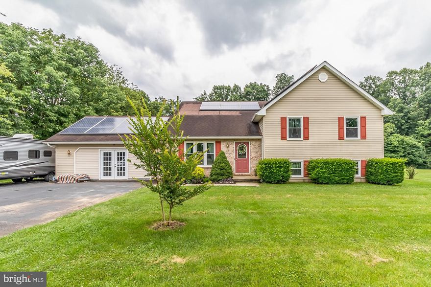 Beautiful 3 tier split level is a must see. 3 Bedroom and 2 full baths and 1 half bath with an additional 4th bedroom in the lower level or it could be used as an excellent work from home office with plenty of privacy. This home contains gleaming Hardwood floors in Dining room, Living room and hallway. *HVAC recently replaced within the last 3 yrs. *New windows last 6 months. * Stove, Dishwasher & Microwave replaces in the last 3 yrs. *Hardwood floors replaced last 4 yrs. *Ceramic tile in kitchen last 6 yrs. The 2 car garage has been converted into additional living space perfect for entertaining. Completely finished lower level could be used as an in-law suite or great family room to hang out in. The home is equipped with Tesla Solar panels that were just replaced approx. 2 yrs ago so you can enjoy the benefit of essentially free electric. Large backyard that currently contains a productive garden for that green thumb in you. 2 large sheds for all of that extra storage.