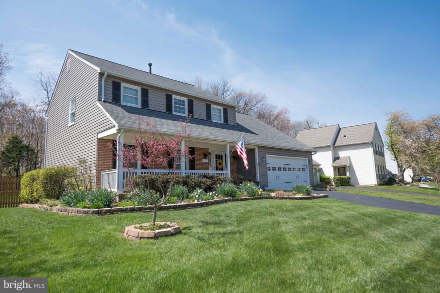 Must see! Wonderfully maintained 4BR/3.5 BA Colonial. Beautiful lot with rear yard backing to trees. Screened-in porch with flagstone floor. Hardwood floors in living room, dining room & family room. Newer roof, siding, & gutters.