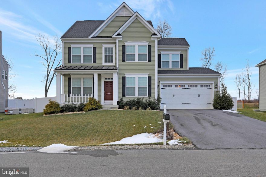 Incredibly beautiful home on a premium lot.  Backs to open farmland.  Meticulously maintained home in desirable Springdale Farm subdivision.  Almost new and already includes rear fenced yard, deck, and patio!  Many upgrades as you would hope for.... including hardwood floors, upgraded counter tops, finished basement just to name a few!  Your home office awaits in this fine executive style colonial with four (4) bedrooms and three (3) full baths and one (1) half bath.   This home is on a full third acre + lot.