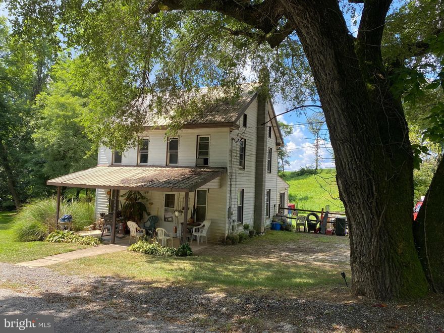 Own your own homestead and use the rental unit to supplement the mortgage. Property backs to a preserved farm, boasts a 6 acre mix of pasture, possible tillable land, and trees. There is also a spring and small stream.