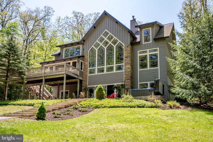 Move in ready!  This well designed 5 bedroom 4.5 bath lakefront retreat offers the perfect prescription for anyone needing to get away from it all.  The wooded 100' lakefront site is virtually maintenance free.  Designed for lakefront living, the  open floor plan with  separate family room, 2 fireplaces, covered porch, lakeside fireplace and private dock site makes for a relaxing experience.  Features include  upgrades including commercial grade carpeting, Murano & Simon Pierce light fixtures, newer hot tub and more,  

Located less than one mile from the recently completed 18 hole Thousand Acres Golf Course and perfect for hiking,  biking and getting away from it all.

It all adds up to a great opportunity.  Schedule your visit today.