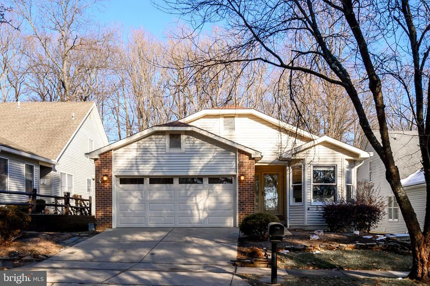 This stunning home is a true standout! Thoughtfully maintained by a meticulous owner, it boasts an inviting open floor plan with 2,698 sqft of finished space, soaring vaulted ceilings, elegant custom light fixtures, and beautiful vinyl flooring throughout.

On the main level, enjoy a spacious living room, along with a bright and airy den featuring skylights and a cozy wood-burning fireplace. Step out onto the deck, which offers serene views of acres of county-owned wooded parkland. There are 3 bedroom and 2 full recently update bathrooms on the main level as well. 

The recently update well-appointed kitchen offers ample space for cooking and entertaining, with a sunny breakfast nook perfect for casual meals. 

The basement features a bonus room with a full bath, ideal for a guest suite, plus a ground-level entrance from the adjacent family room. Custom-built bookcases add charm and function, while an expansive 26x19 unfinished area provides abundant storage space. The impressive Media Room is your go-to spot for game days and movie nights—the seller is even including the theater seating and a 75" HD media screen!

Located in the premier 55+ community of Heritage Harbour, this home comes with access to exceptional amenities, including golf (separate membership), a clubhouse, restaurant, tennis & pickleball courts, billiards, indoor & outdoor pools, a bocce ball court, and a state-of-the-art fitness center with an aerobics studio. Residents also enjoy a private pier on the South River with ten 30-ft. boat slips, as well as a vibrant selection of special interest groups. A one-time recreational fee of $2,055 is due at settlement.