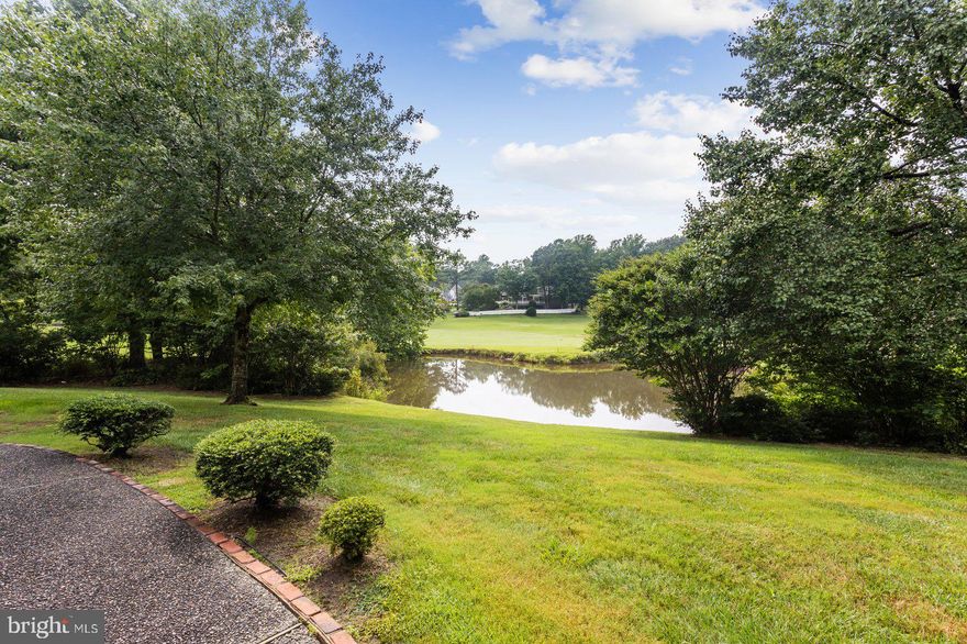 HUGE GOLF & WATER VIEWS! This custom brick home is located on a large interior lot on a quiet street close to the main swim & tennis center, walking trails & country club. It is move-in ready with a newer roof w/50 yr. shingles, sealed crawl space w/dehumidifier, water heater, air conditioner w/10 year warranty, & 32 windows!! This home has huge amounts of storage including a large walk in pantry. The main floor offers great one level living that is functional with defined spaces yet has great flow for entertaining. A beautiful sun room and outdoor patio face the expansive stunning views this home offers. Three en-suite bedrooms are perfect for a family and guests alike.
