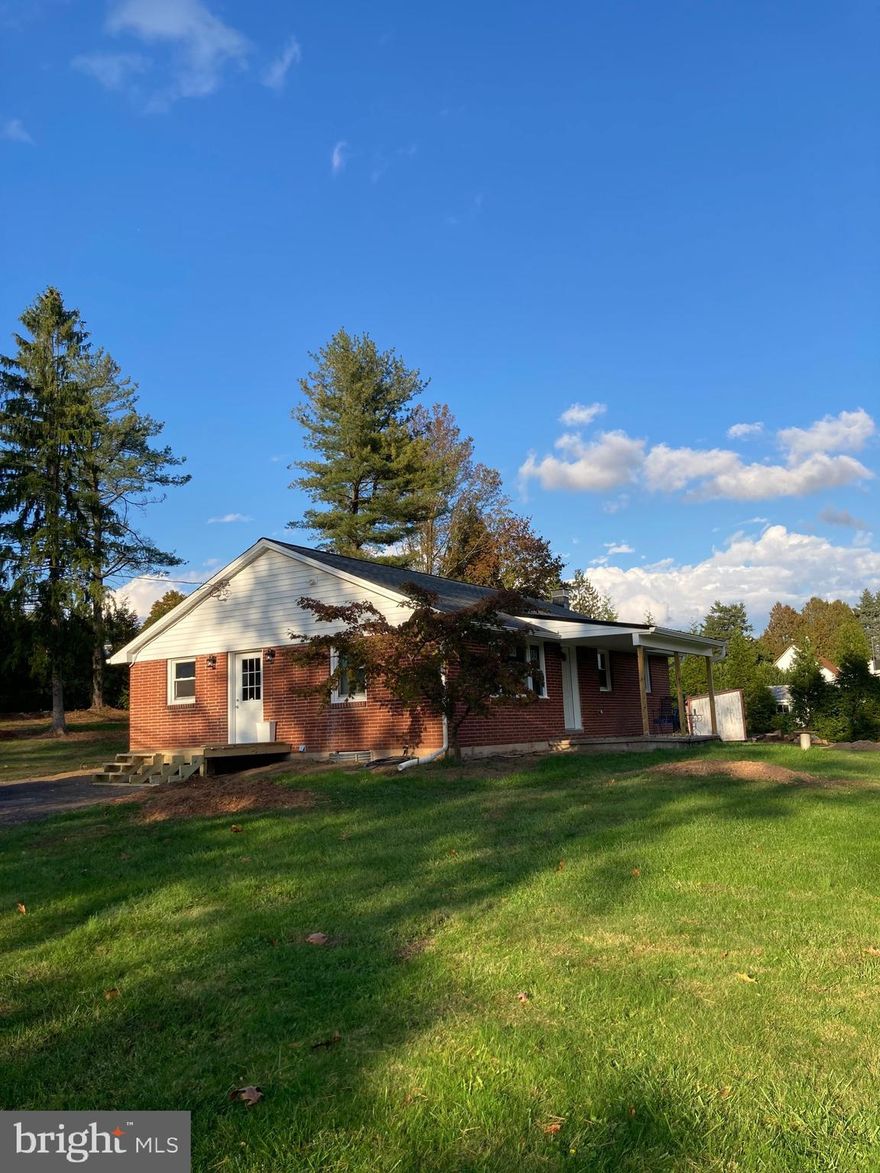 Welcome to 1401 Red Hill Road nestled in the picturesque countryside conveniently located near the Berks & Chester County Line.  This home has been completely renovated from top to bottom with modern finishes and all major systems upgraded leaving no stone unturned! Enjoy the upcoming spring weather in the well manicured .57 acres of level yard with mature surrounding landscaping.  Marvel in the ease of single floor living as you step inside to a large open living room drenched in natural sunlight.  The engineered hardwood floors are perfectly accented with the fresh neutral color scheme and white chair rail. Entertaining has never been easier as the living room flows perfectly into the open dining room and kitchen area.  Boasting modern cabinetry with gold fixtures, ample corian countertops space, brand new stainless steel appliances, the kitchen will quickly become the heart of your home. Just off the kitchen you will find the mudroom with shiplap accent walls and basement access.  Down the hall you will find 3 generously sized bedrooms each with brand new carpeting, overhead ceiling fans with lighting for convenience and comfort & large closets. Centrally located is the brand new hall bathroom with engineered marble tile flooring, coordinating vanity and large tub shower combo. As if the main living of the home doesn’t offer enough, head down to the unfinished basement where your imagination can soar.  Spanning the entire blueprint of the home and recently waterproofed with lifetime guarantee of no water breaches this space can easily be finished for additional living area, be used as a gym, storage or anything that fits your ever changing life needs. Buy with peace of mind knowing all electrical (including service box & breaker box) has been replaced in addition to new plumbing, heating system, water heater, pressure tank.  The new roof, windows, doors and brand new at grade septic system is the icing on the cake.  Nothing left to do but pack your bags and move on in! Schedule your tour today, this is the one you’ve been waiting for!  Professional pictures to come!