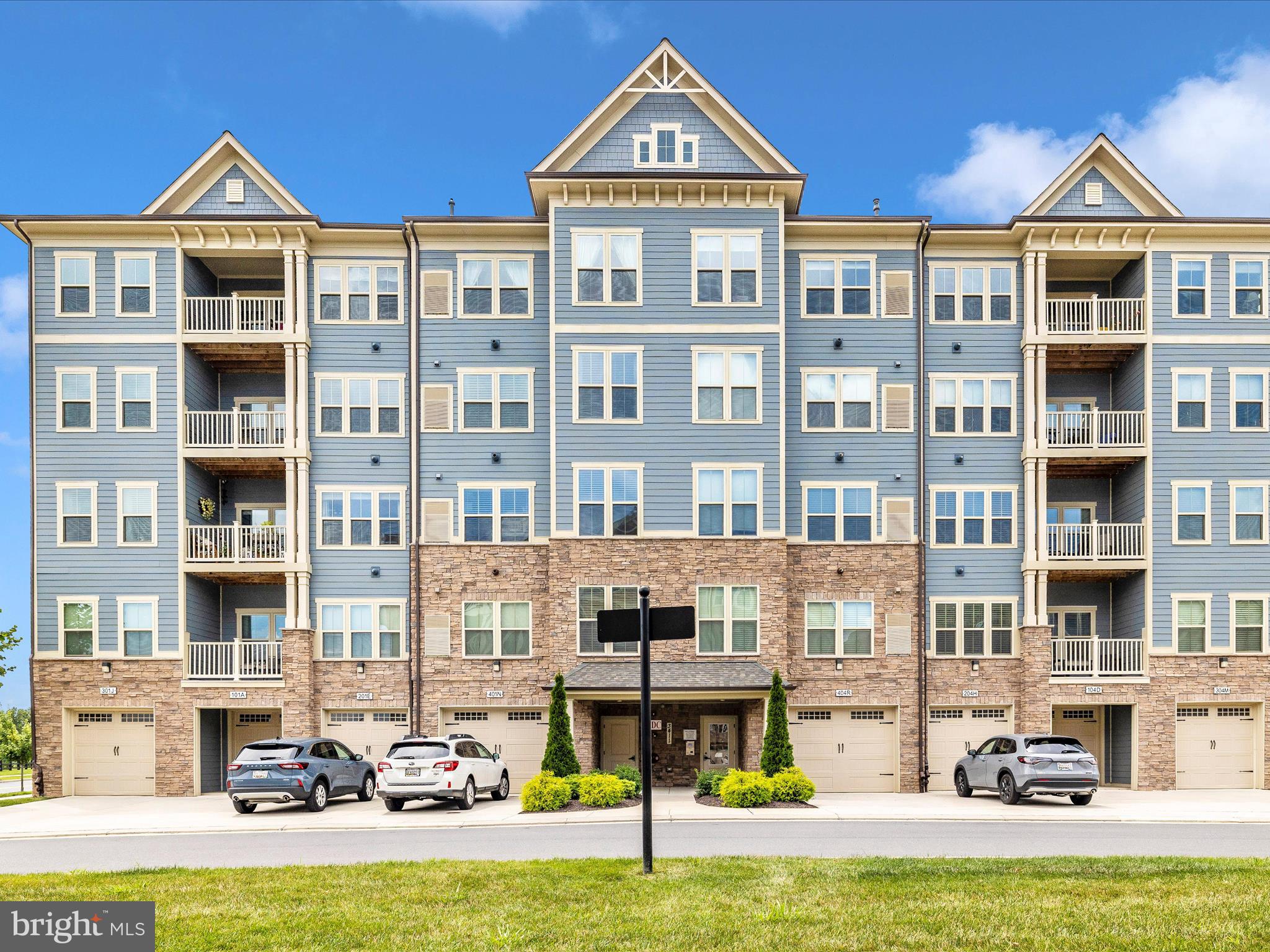 Welcome to 3411 Angelica Way #102, a beautifully maintained condo in the sought-after 55+ The Woodlands community in Urbana. Originally built in 2020 as a showcase model, this home has since been impeccably cared for by its sole owner and is ready for its next chapter. Conveniently located on the second floor just steps from the elevator, this unit offers unmatched accessibility, including a private 1-car garage with interior building access. Step inside to an inviting, open-concept layout featuring a gourmet kitchen with quartz countertops, stainless steel appliances, a large island, and a seamless flow into the dining and living areas—perfect for entertaining or quiet relaxation. The private balcony off the living room is ideal for morning coffee. The spacious primary suite includes a bedroom retreat, a generous walk-in closet, and a luxurious en suite bath. A second bedroom with an attached full bath offers comfort and privacy for guests or additional living space. Additional features include a welcoming foyer, coat closet, in-unit laundry, and dedicated storage space. Enjoy a low-maintenance lifestyle and take full advantage of The Woodlands’ exceptional amenities, including a stunning clubhouse, fitness center, outdoor pool, pickleball and bocce courts, walking trails, and a calendar full of social activities and events. With lawn care, exterior maintenance, and snow removal handled for you, there’s more time to enjoy the vibrant community around you. Come experience luxury, comfort, and convenience all in one at The Woodlands at Urbana—schedule your private showing today!