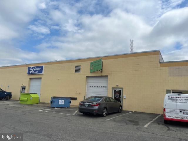 Conveniently located warehouse in north Waldorf, suitable for a variety of uses. Ideal for the electrician, plumber, HVAC contractors or other trades. No church or assembly type use will be permitted. Small office with one bathroom, balance of the unit is warehouse. Large overhead door on the front of unit and two ceiling mounted oil forced air heaters, plus two separate ceiling mounted electric heaters. One window AC for office.