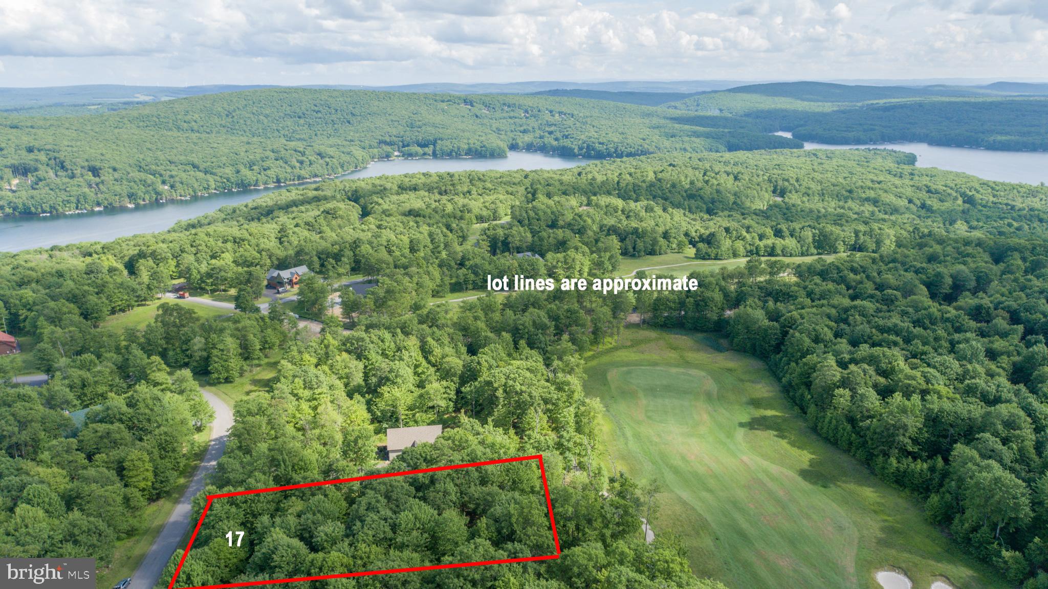 Golf Front Building Lot at Deep Creek Lake - This beautiful wooded homesite offers .63 acres of level building space and directly adjoins Hole #12 of Lodestone Golf Course. Located in the Sandy Shores Heights community, just minutes from local restaurants, state parks and Wisp Resort. All public utilities to site and ready to build. Call today for details!