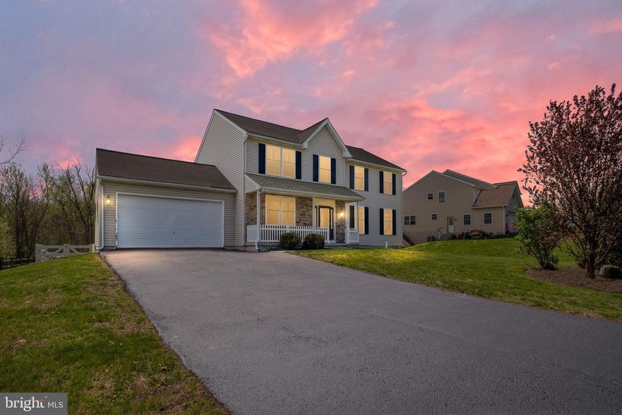 Welcome to 435 Old Philadelphia Pike, a spacious and well maintained 4 bedroom, 2.5 bath home in a highly convenient Douglassville location.  Tucked just minutes from Routes 422 and 100, this property offers easy access for commuting while being close to everyday essentials including shopping, dining, and the Philadelphia Premium Outlets.  Inside, durable LVP flooring flows throughout the home, leading into a large eat in kitchen that opens seamlessly to the family room with a fireplace, creating an ideal layout for both everyday living and entertaining.  The main level also features a formal dining room, flexible living space perfect for a home office or additional sitting area, and convenient first floor laundry.  Upstairs, the spacious primary suite includes a walk in closet, and a beautifully en suite bathroom with double vanity and oversized tiled shower.  Three additional generously sized bedrooms and a full hall bath complete the second floor. Step outside to enjoy the standout 16x30 covered porch overlooking the fenced backyard, complete with a gazebo and shed, perfect for relaxing or hosting year round.  Additional highlights include replacement windows and doors, propane cooking, heat, and hot water, a whole house Generac generator, a 2 car garage with electric vehicle hook up, and a separate paved side driveway with 220 volt hookup ideal for an RV, electric vehicle, or extra parking.  A rare combination of indoor space, outdoor amenities, and unbeatable convenience.