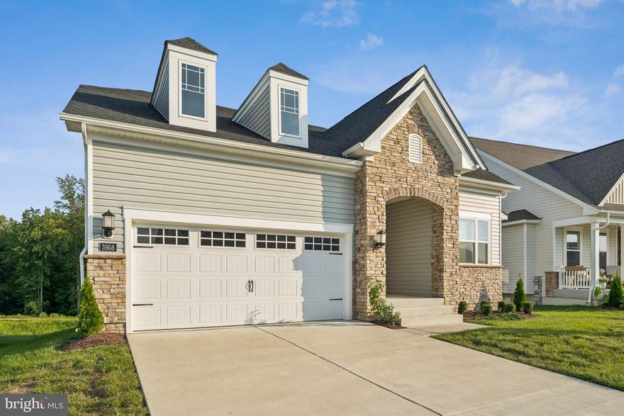 This stunning home boasts over a remarkable 4,111 square feet of luxurious living space, where every detail has been meticulously crafted to elevate your everyday experience. Step inside to find a harmonious blend of elegance and comfort. The gourmet kitchen is a chef's dream, featuring upgraded countertops, a spacious island, and top-of-the-line stainless steel appliances, including a double wall oven and built-in range. The open layout seamlessly connects the kitchen to the family room, perfect for entertaining or enjoying quiet evenings by the gas fireplace. Crown moldings and recessed lighting add a touch of sophistication throughout the home, while window treatments ensure privacy and style. Retreat to the primary suite, where a lavish walk-in closet and a spa-like bathroom with a walk-in shower await. Each additional bedroom offers ample space and comfort, ensuring that guests feel right at home. The fully finished basement, complete with a walkout entrance, provides endless possibilities for recreation or relaxation. Outside, the property is adorned with beautiful vinyl siding and stone accents, creating a striking curb appeal. Enjoy the serenity of your enclosed and screened porch, perfect for morning coffee or evening gatherings. The community amenities are second to none, featuring a clubhouse, outdoor pool, dog park, and recreational center, all designed to foster a vibrant and active lifestyle. With an attached garage and additional driveway parking, convenience is at your fingertips. The association fee covers common area maintenance, lawn care, and snow removal, allowing you to focus on enjoying life rather than worrying about upkeep. This exceptional home not only offers luxurious living but also a sense of community and belonging. Embrace the exclusive lifestyle that awaits you in The Parklands, where every day feels like a retreat. Don't miss your chance to make this dream home your reality!